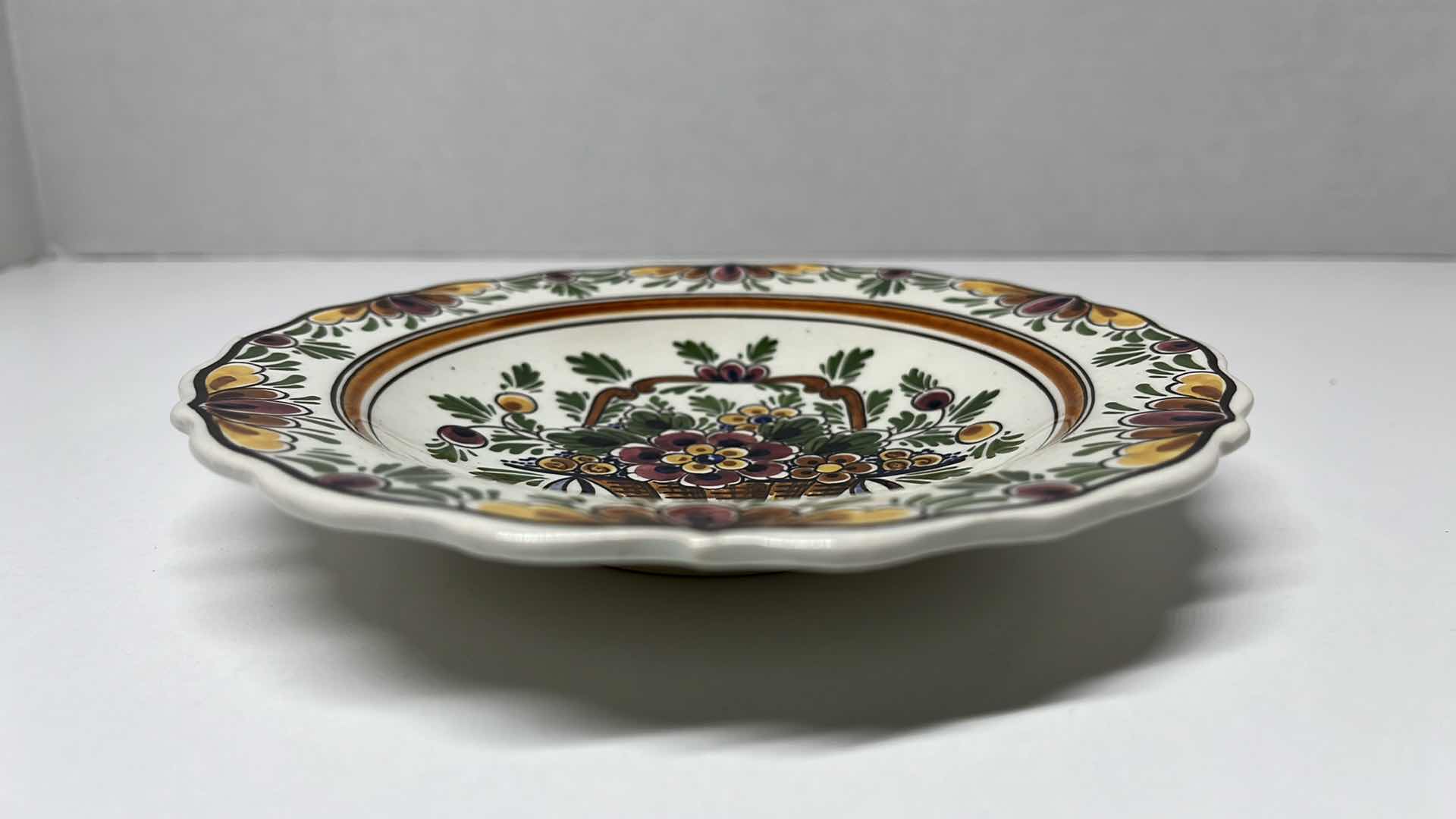 Photo 1 of DELFT HOLLAND HAND PAINTED FLORAL DISPLAY PLATE 6.25” W GOLD FINISH DISPLAY STAND