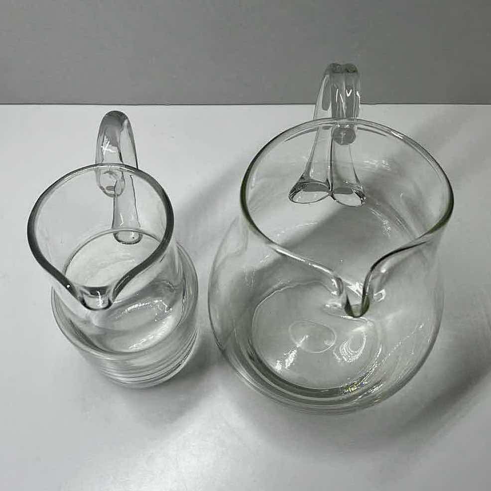 Photo 1 of CLEAR GLASS PITCHERS (2) 5.5”/7” X 7”/8”