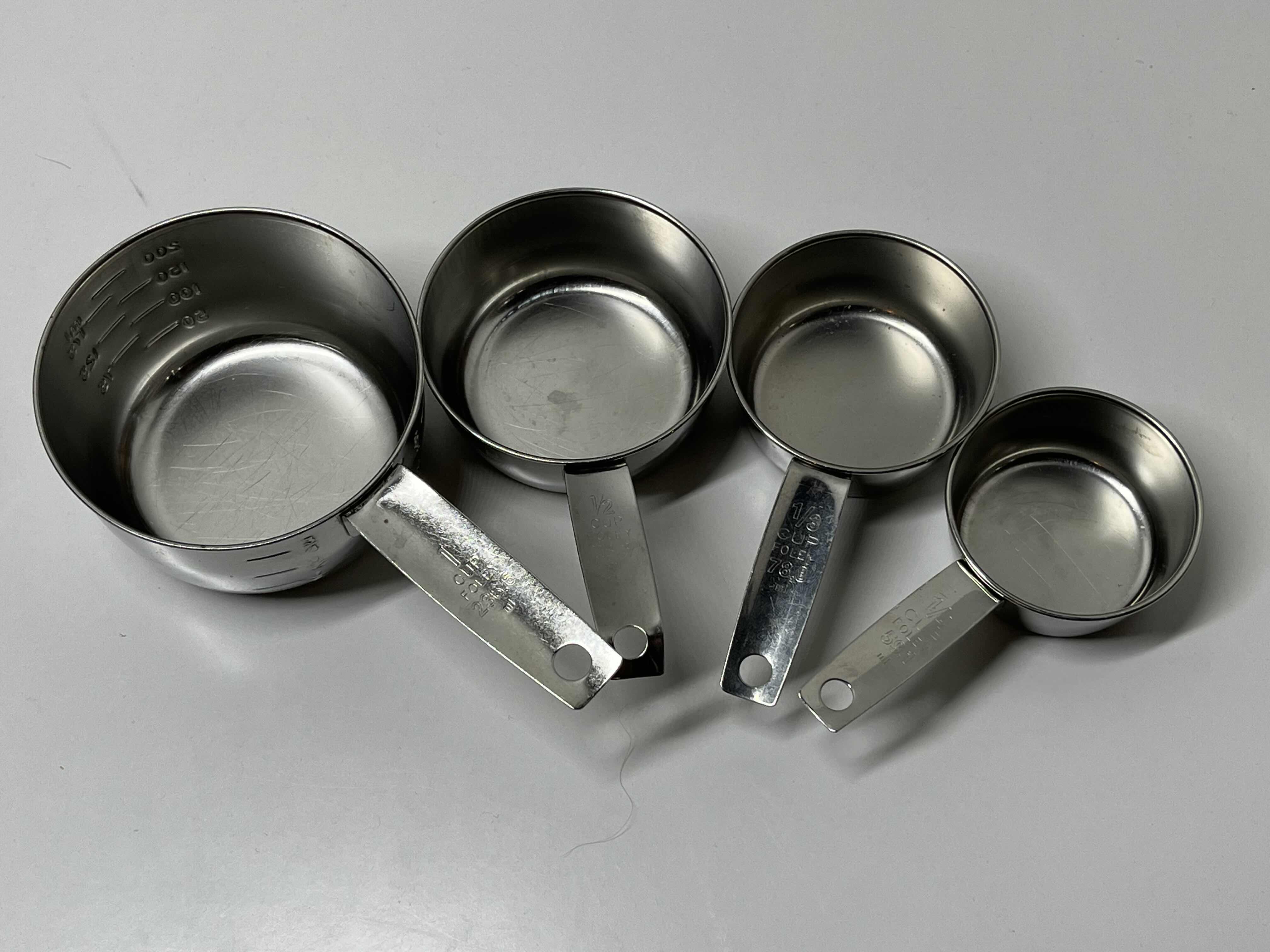 Photo 2 of FOLEY STAINLESS STEEL MEASURING CUP SET (4) 1/4CUP-1CUP