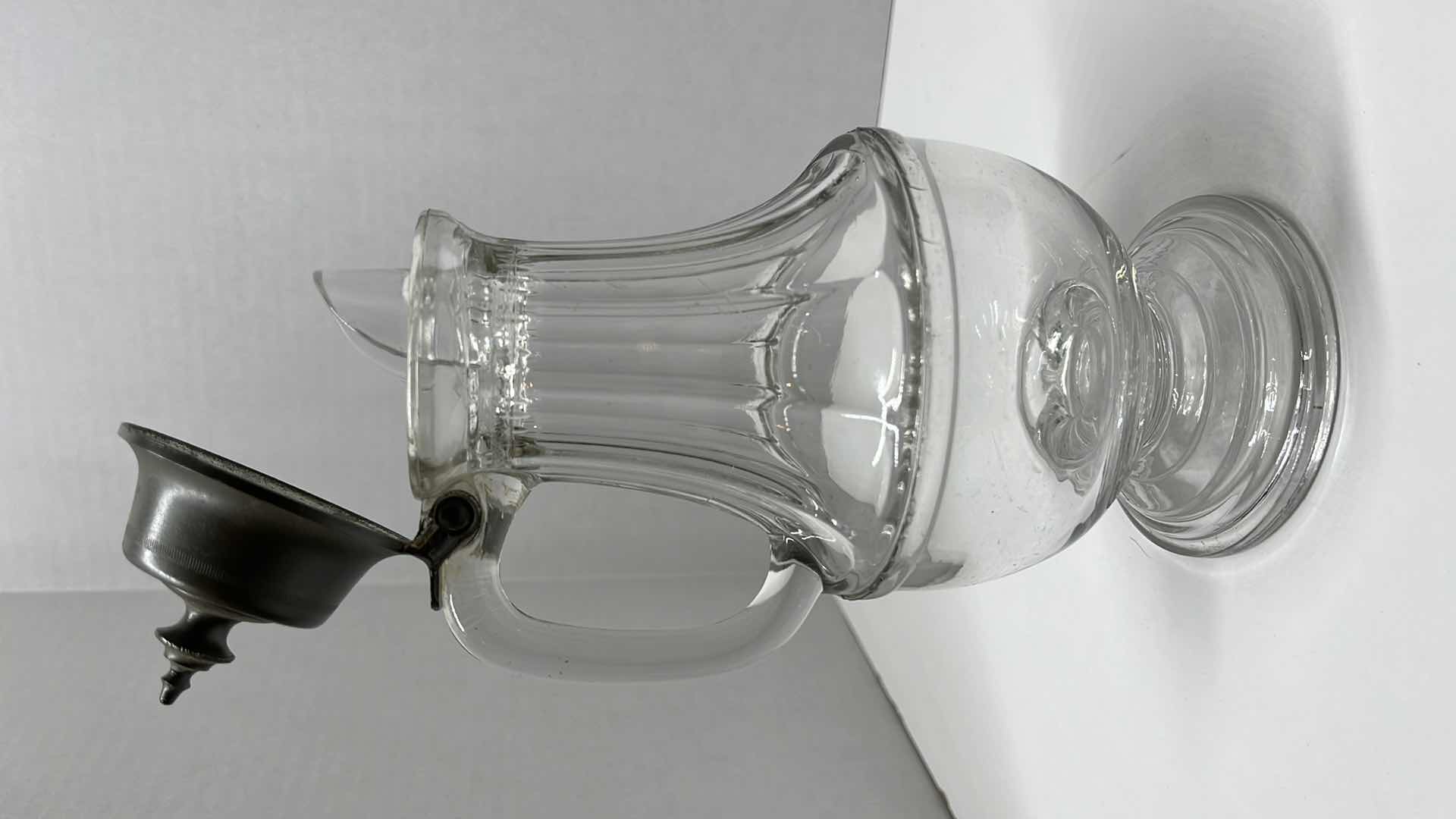 Photo 1 of ANTIQUE SILVER PLATED FOOTED GLASS CREAMER 4” X 9”