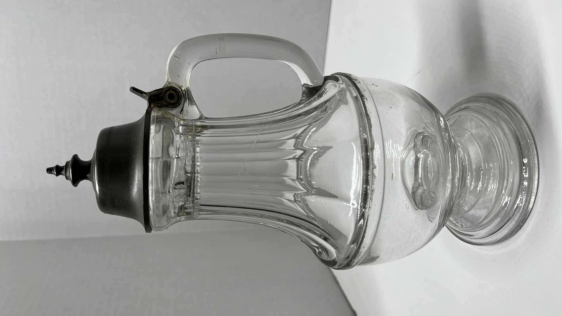 Photo 1 of ANTIQUE SILVER PLATED FOOTED GLASS CREAMER 4” X 9”
