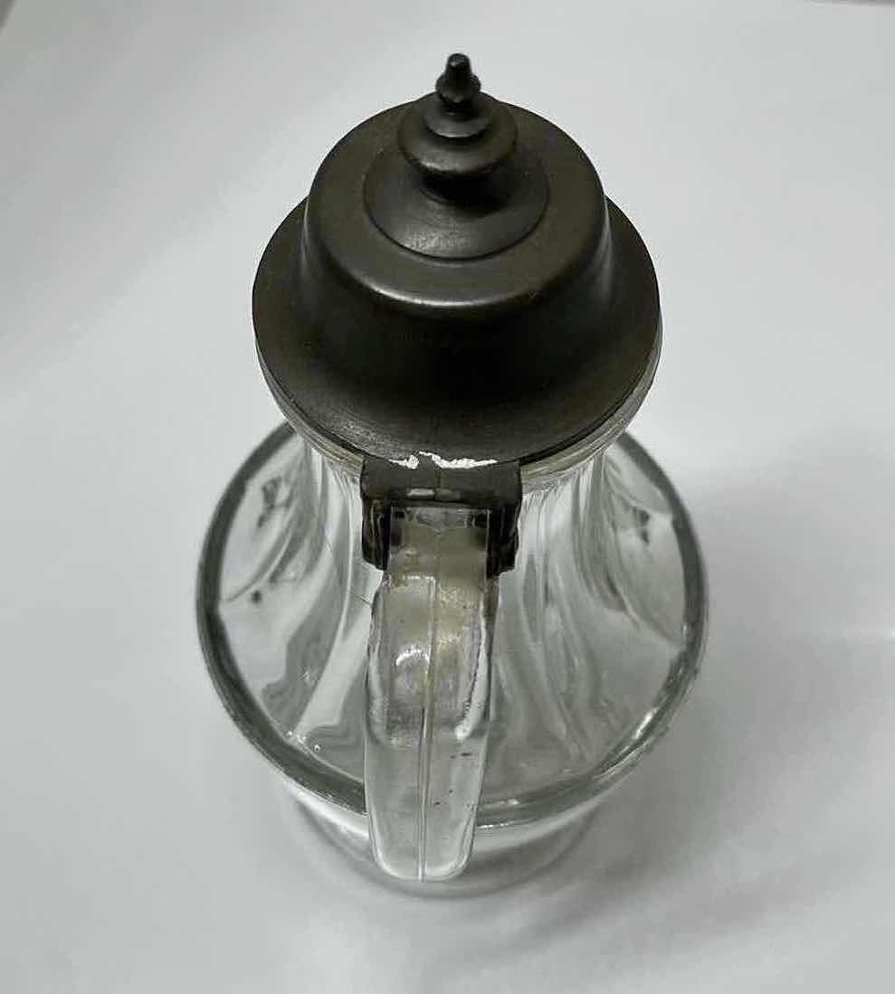 Photo 1 of ANTIQUE SILVER PLATED FOOTED GLASS CREAMER 4” X 9”