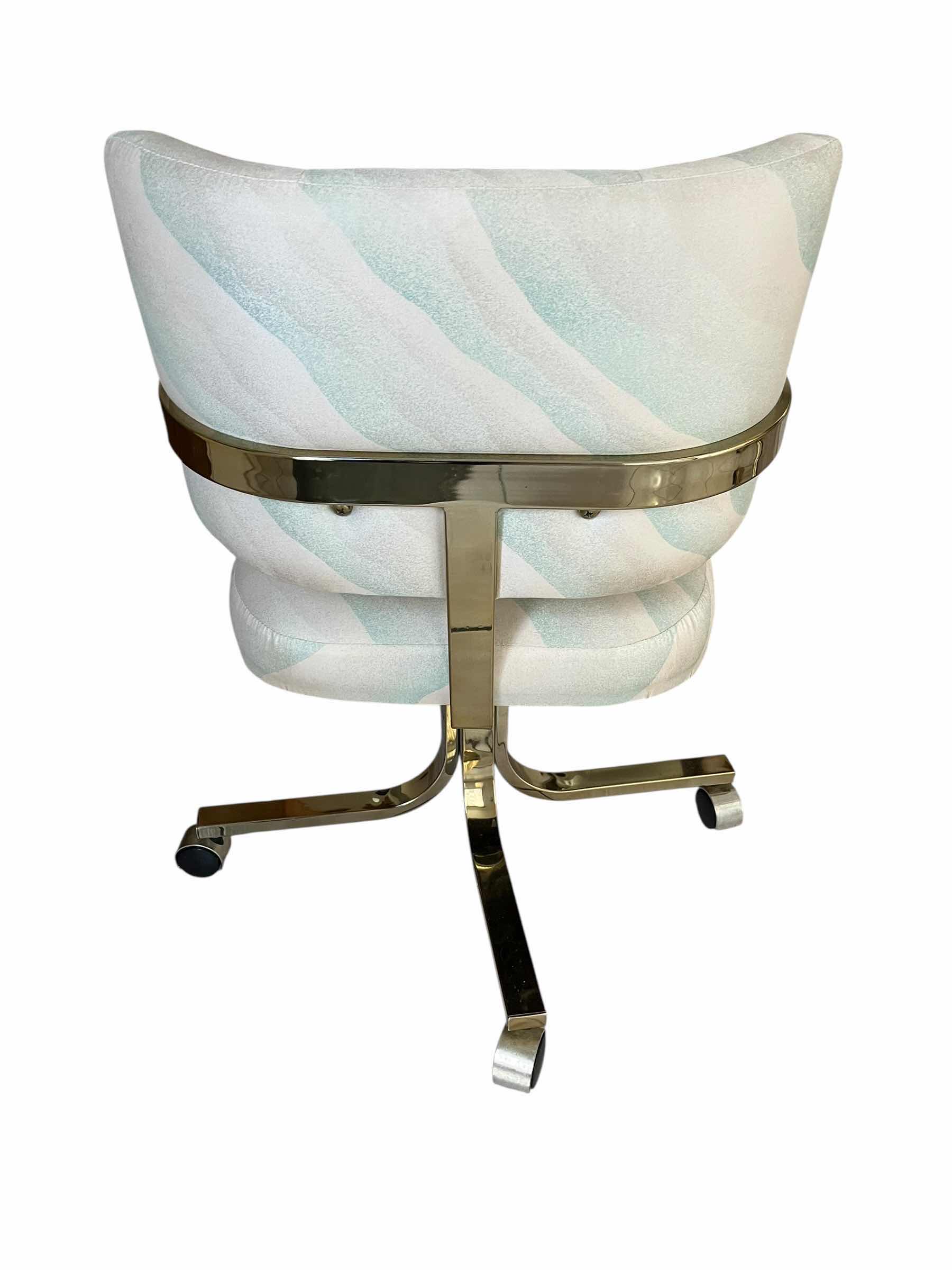 Photo 1 of BRASS FRAMED GLASS TOP TABLE & PASTEL UPHOLSTERED ROLLING 4 CHAIR DINING SET