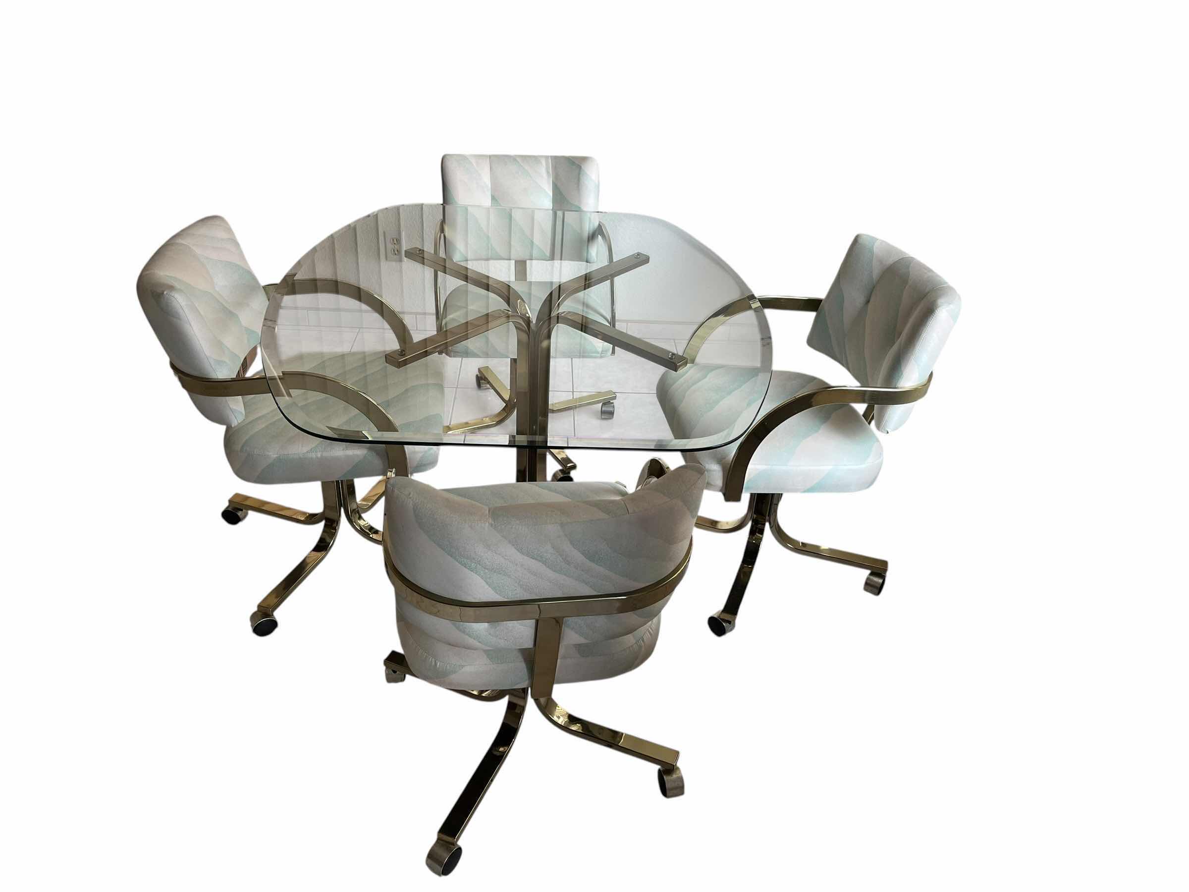 Photo 1 of BRASS FRAMED GLASS TOP TABLE & PASTEL UPHOLSTERED ROLLING 4 CHAIR DINING SET
