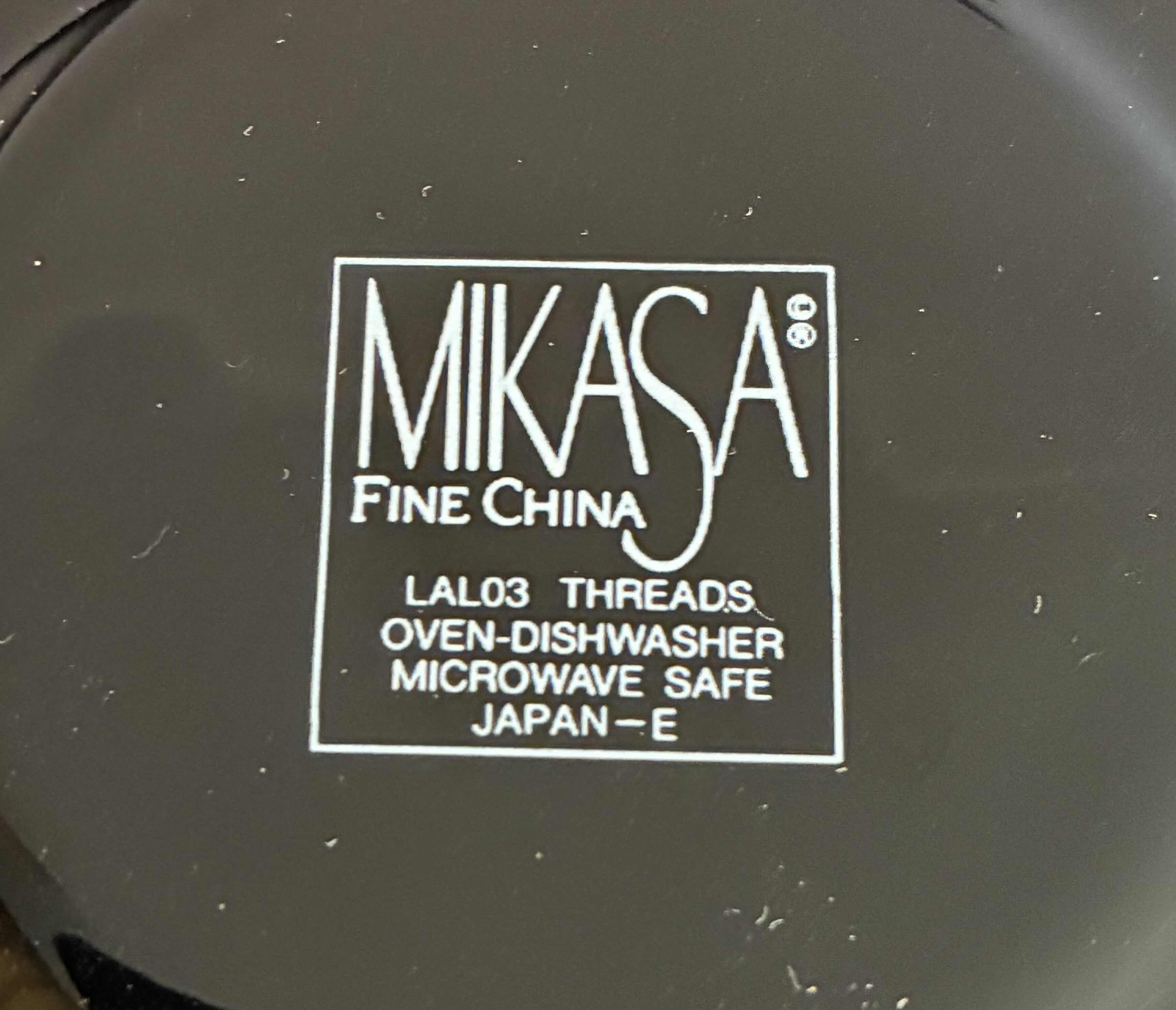 Photo 1 of MIKASA THREADS COLLECTION BLACK FINE CHINA TEA SAUCERS (8) $80