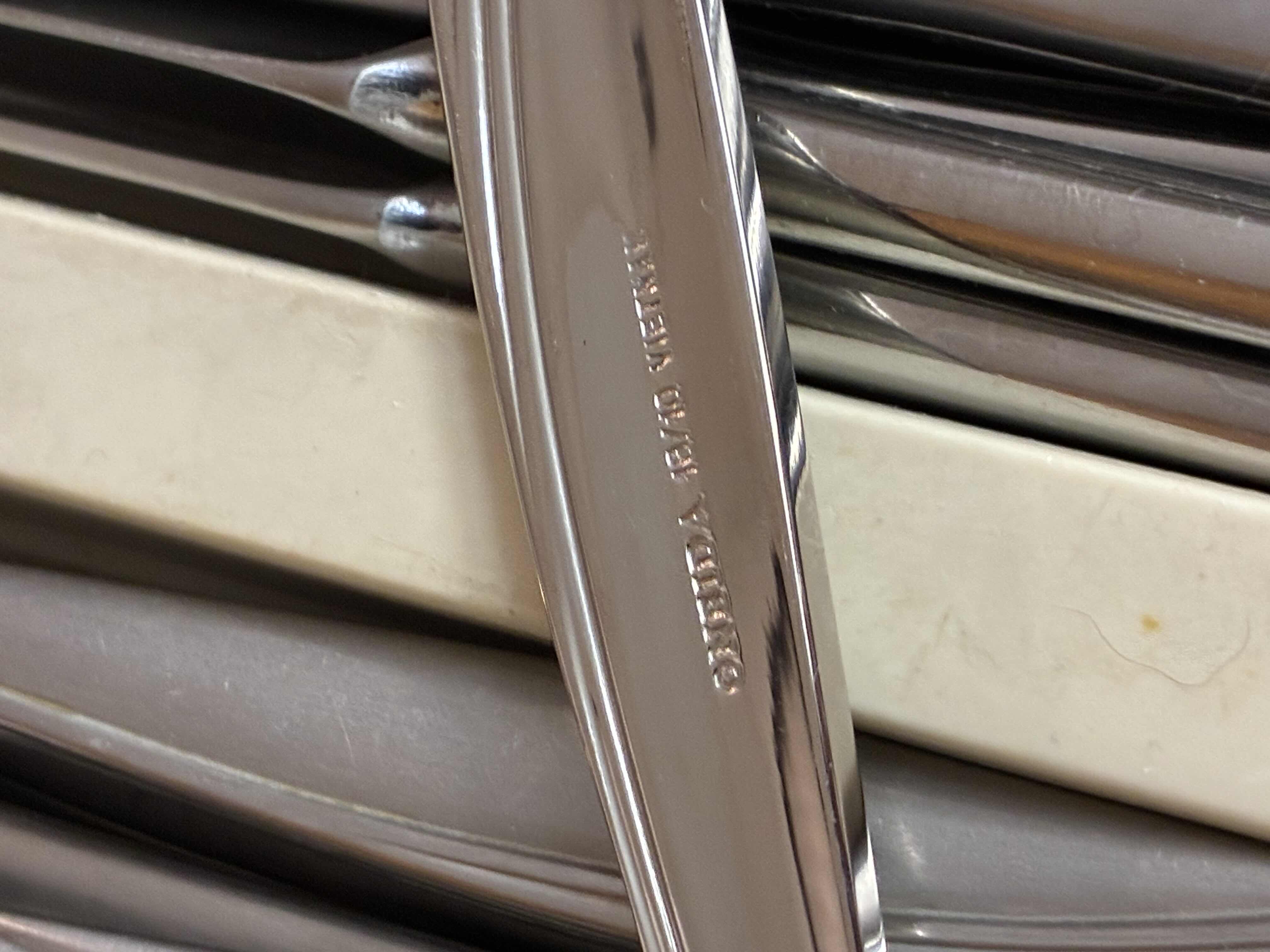 Photo 1 of ONEIDA 18/10 STAINLESS STEEL FLATWARE SET W KITCHEN UTENSILS, CHOPSTICKS & CUTLERY