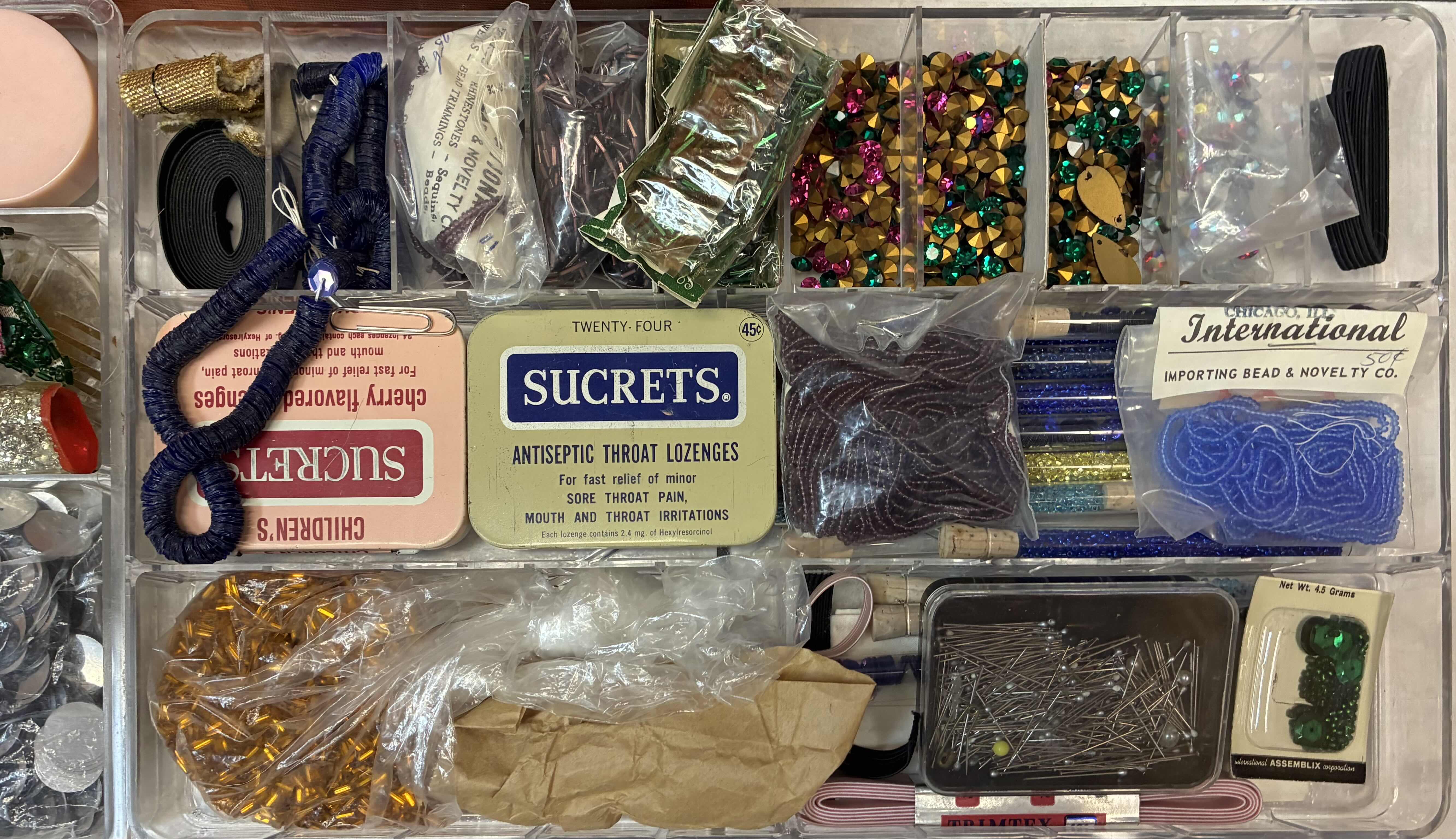 Photo 1 of AMBER TRANSPARENT SEWING ORGANIZING BOX W SEWING MATERIALS