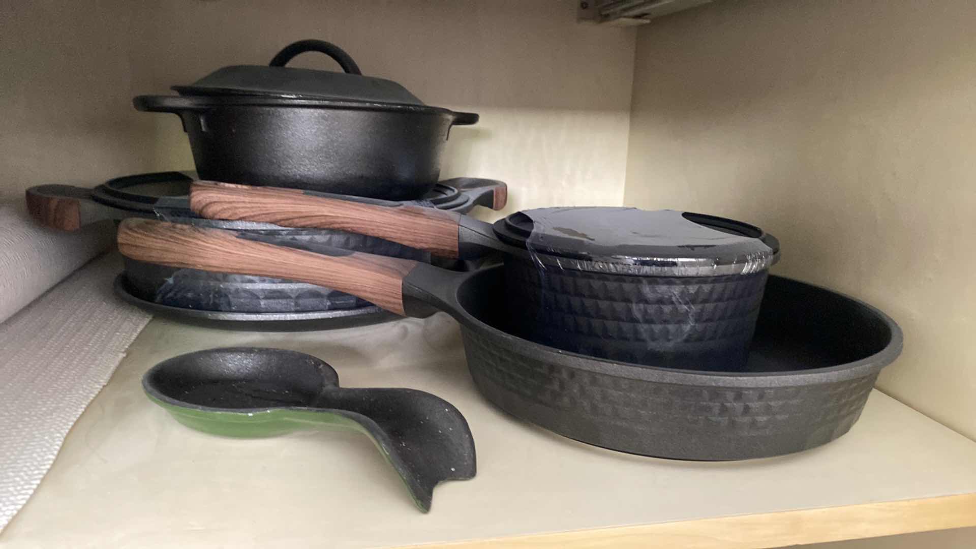 Photo 1 of CONTENTS KITCHEN CABINET CAST IRON PANS AND SMALL ENAMEL ROASTER