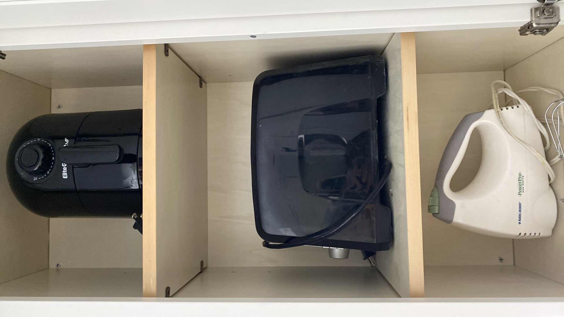 Photo 1 of CONTENTS KITCHEN CABINET ELITE GOURMET AIR FRYER, BLACK AND DECKER TOASTER AND HAND MIXER