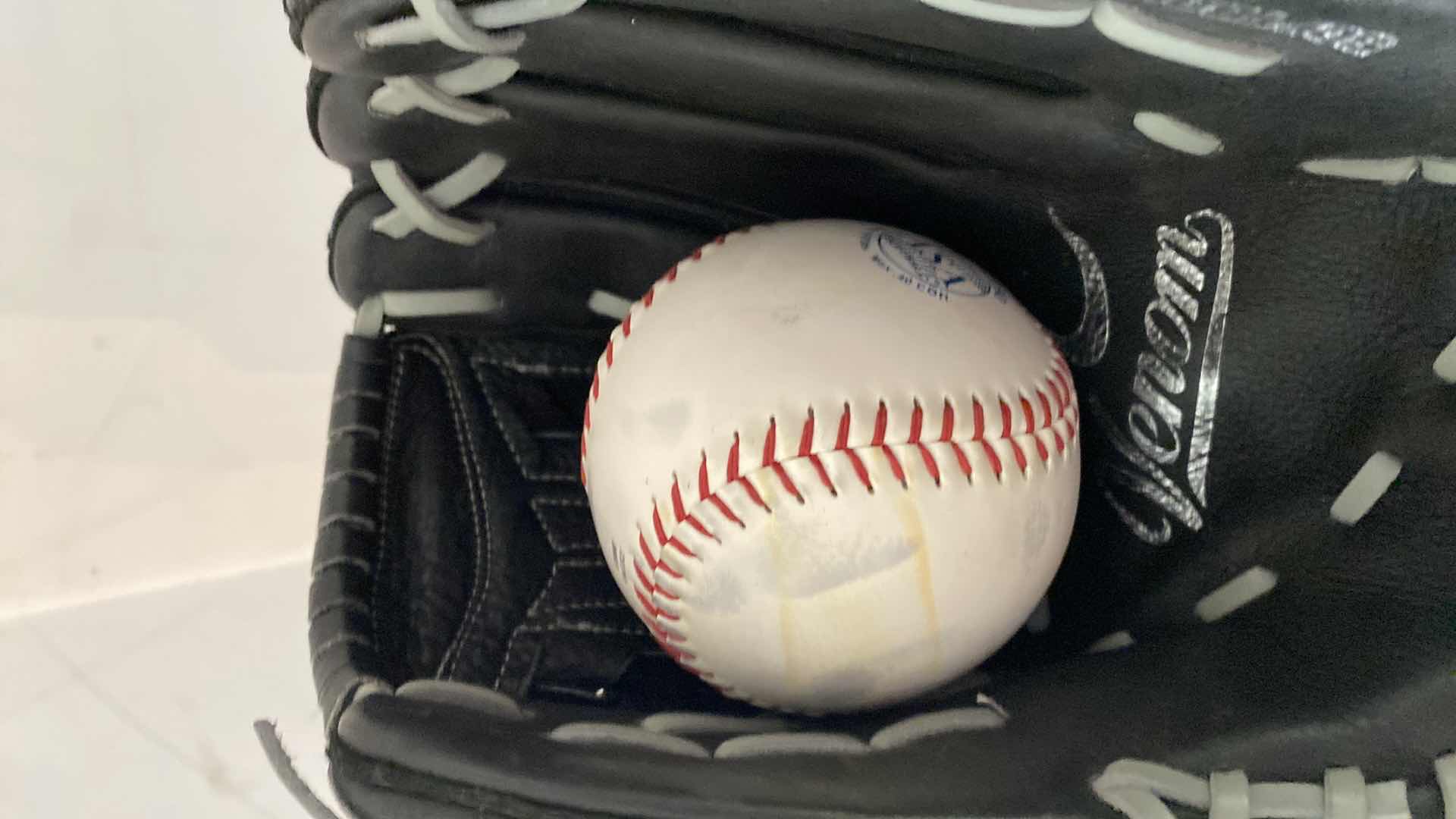 Photo 1 of 2 BASEBALL/SOFTBALL GLOVES & SOFTBALL