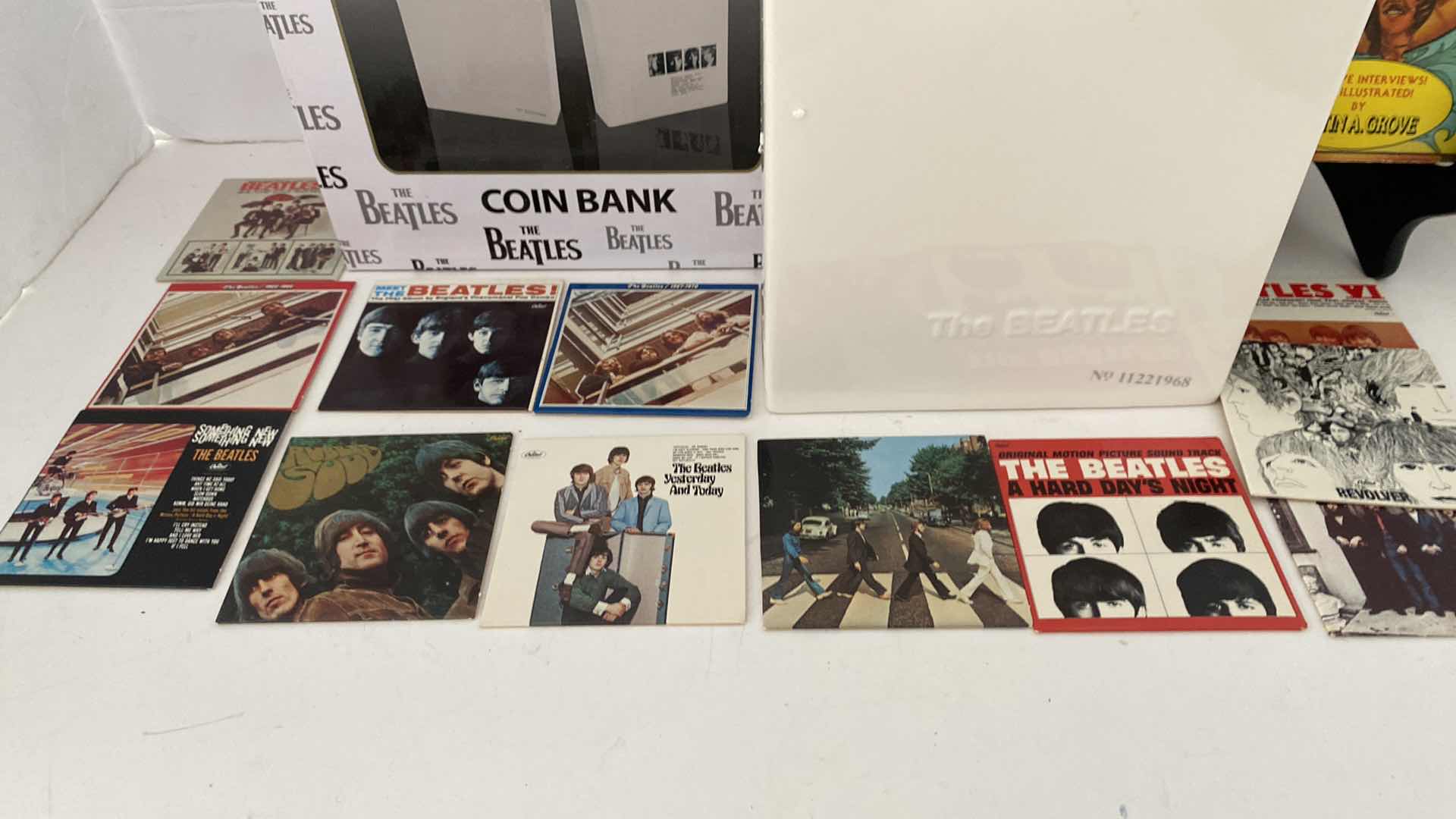 Photo 1 of BEATLES NUMBERED LIMITED EDITION BANK AND MUNIATURE ALBUM COLLECTION
