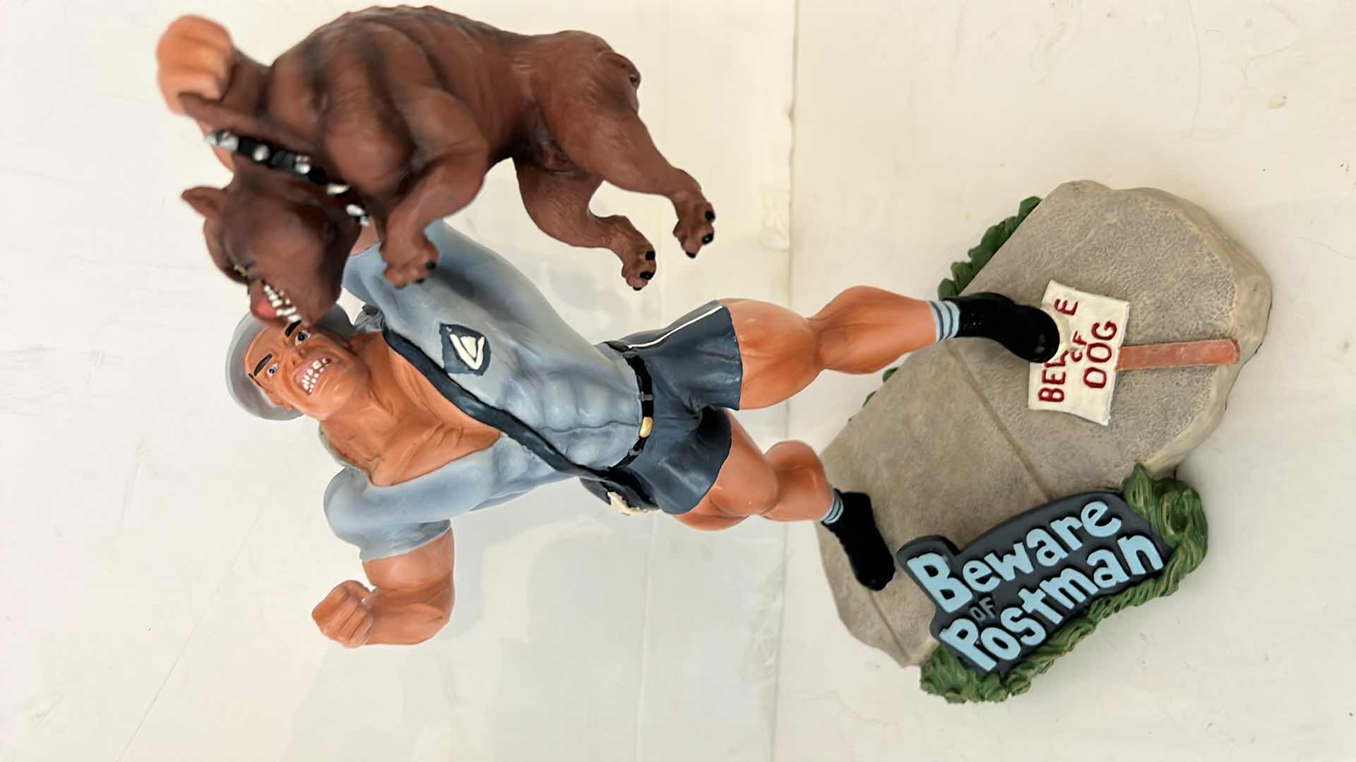 Photo 1 of BEWARE OF POSTMAN STATUE H10.5”