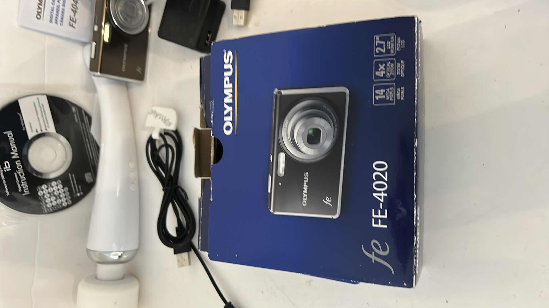 Photo 1 of ELECTRONICS- OLYMPUS CAMERA AND MASSAGER