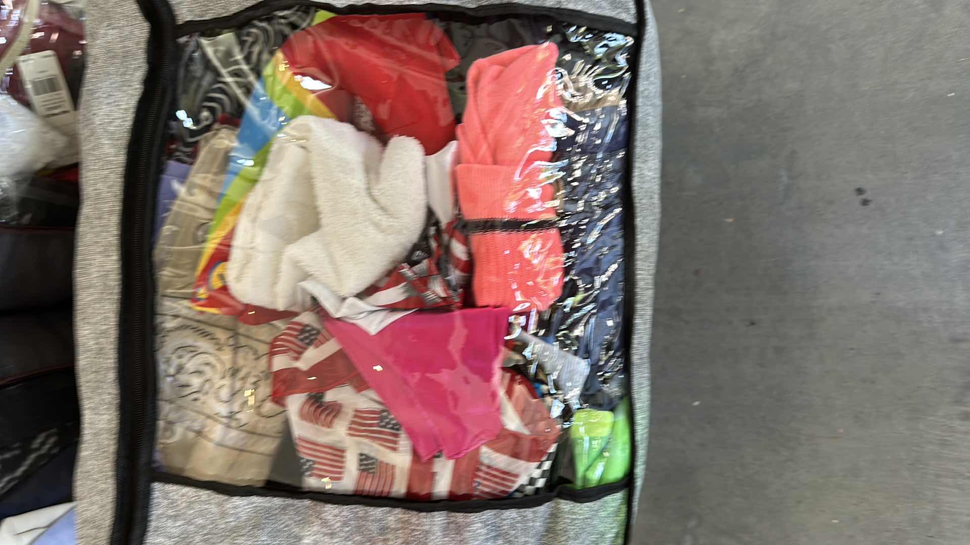 Photo 1 of THREE BAGS OF CLOTHES
