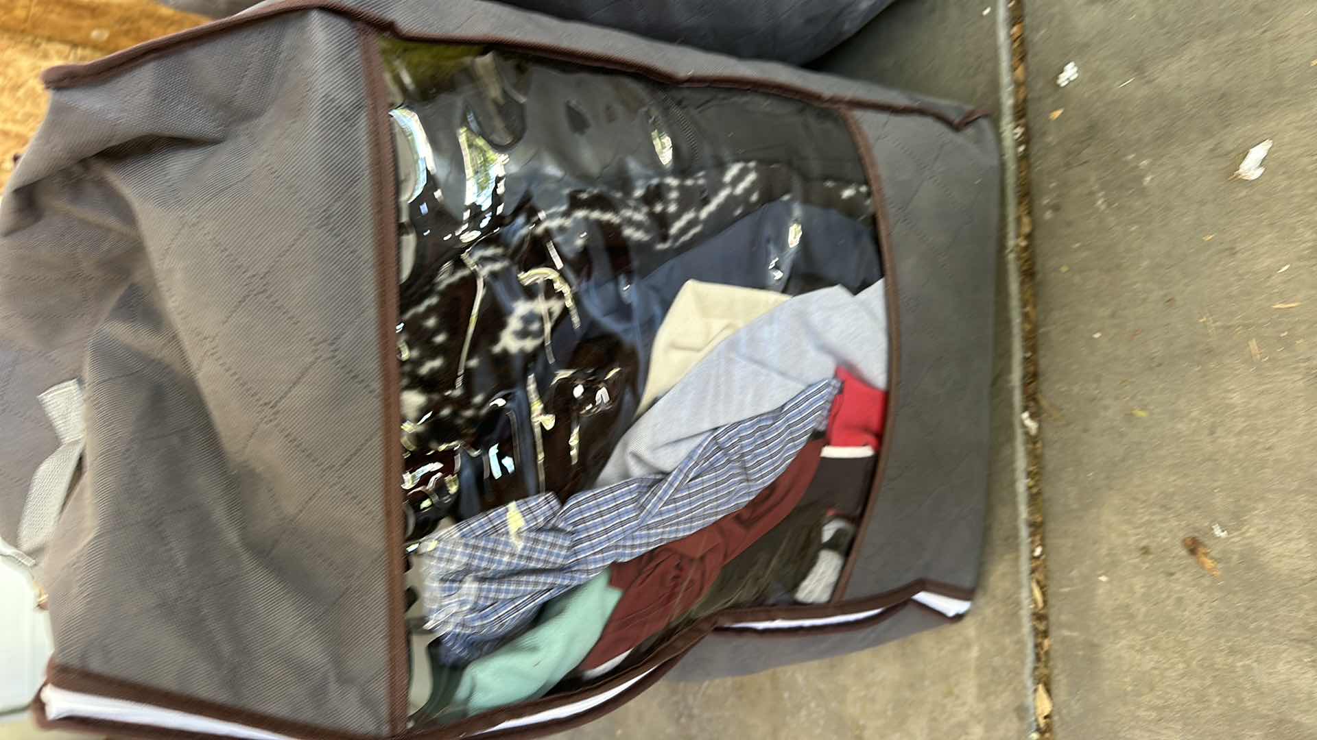 Photo 3 of THREE BAGS OF CLOTHES