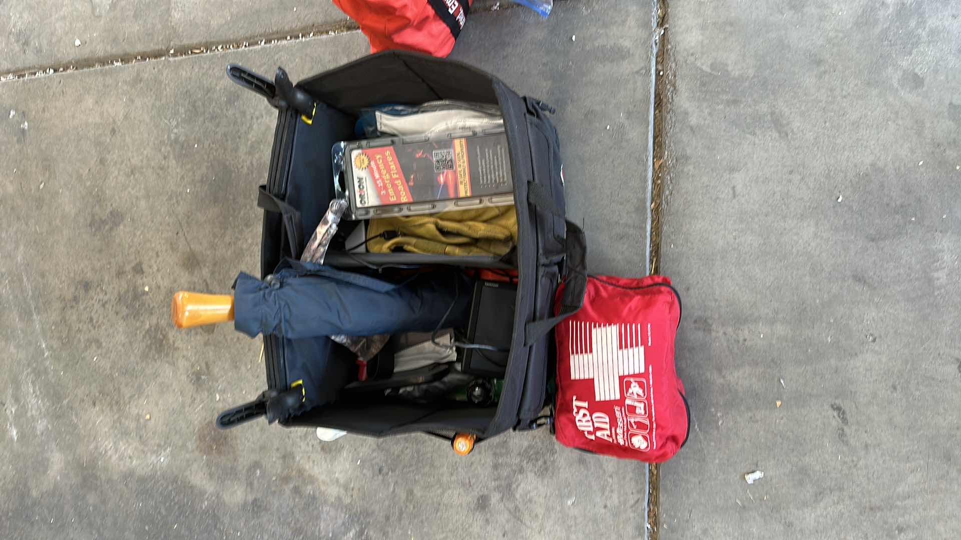 Photo 1 of BAG OF FIRST AID AND CAR ITEMS