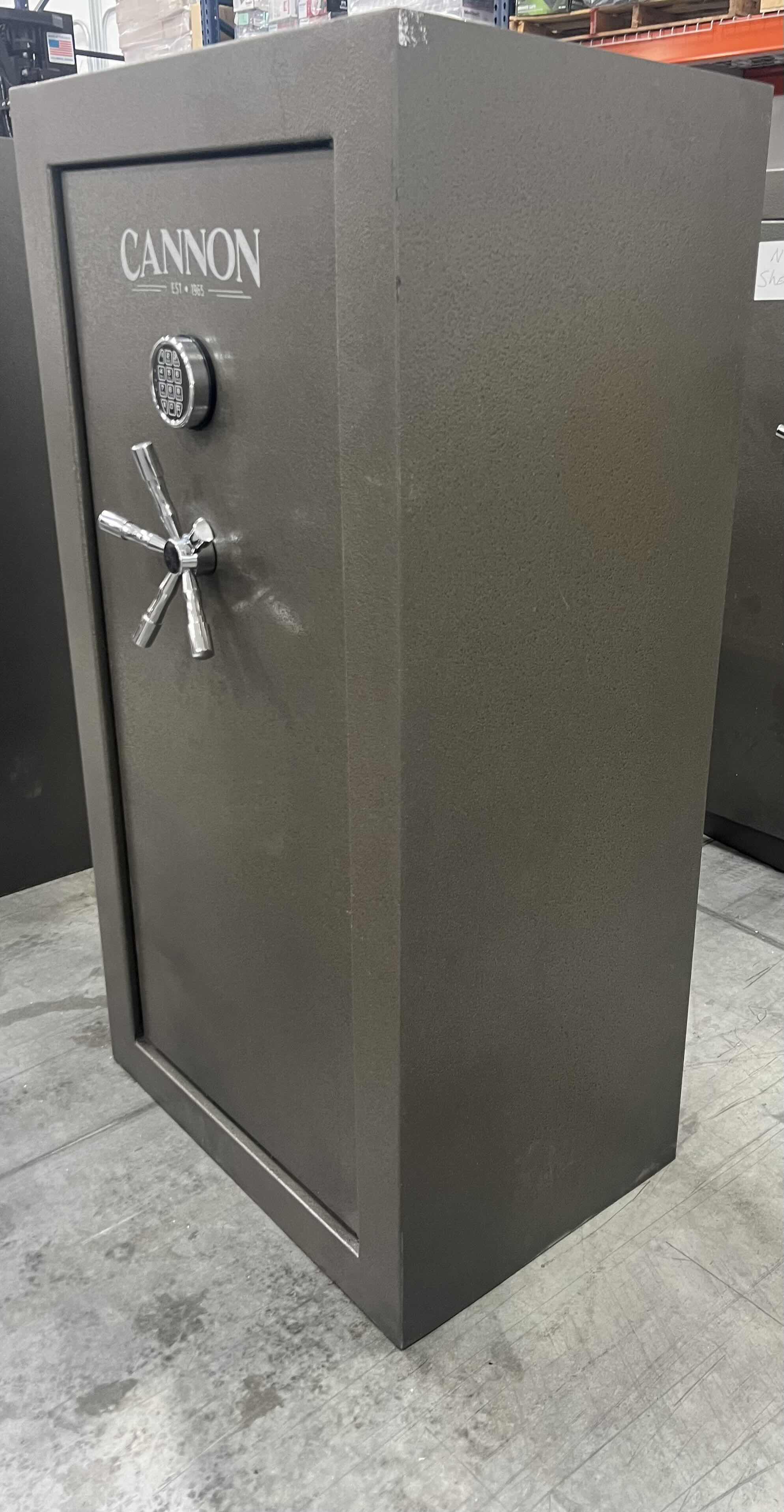 Photo 1 of CANNON FIREPROOF 36 + 4 GUN SECURITY SAFE, ELECTRONIC LOCK W KEY, TRULOCK HINGE, GREY - USED  30” x 20” H55”
