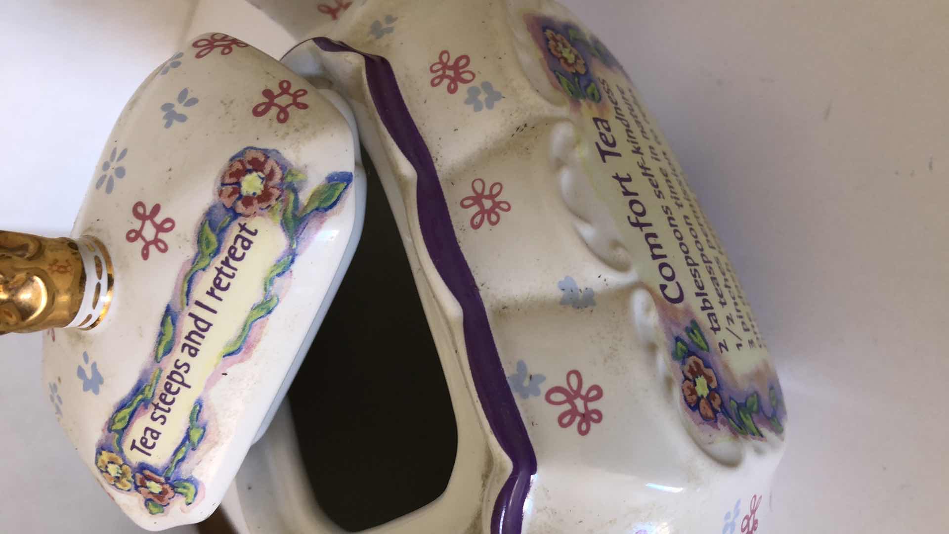 Photo 1 of TEA POTS AND A CANDLE HOLDER