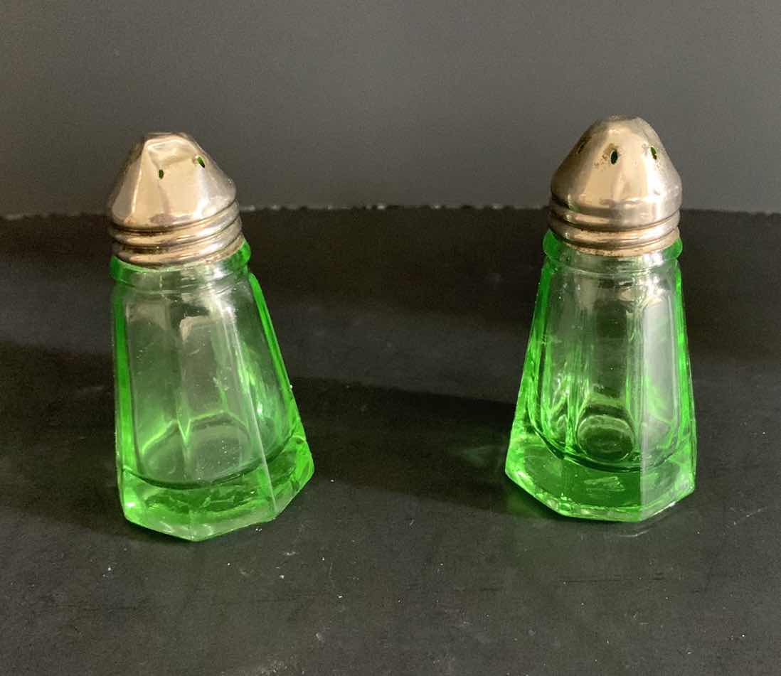 Photo 1 of VINTAGE SALT AND PEPPER SHAKERS IN GREEN GLASS AND CANDLE SNUFFER