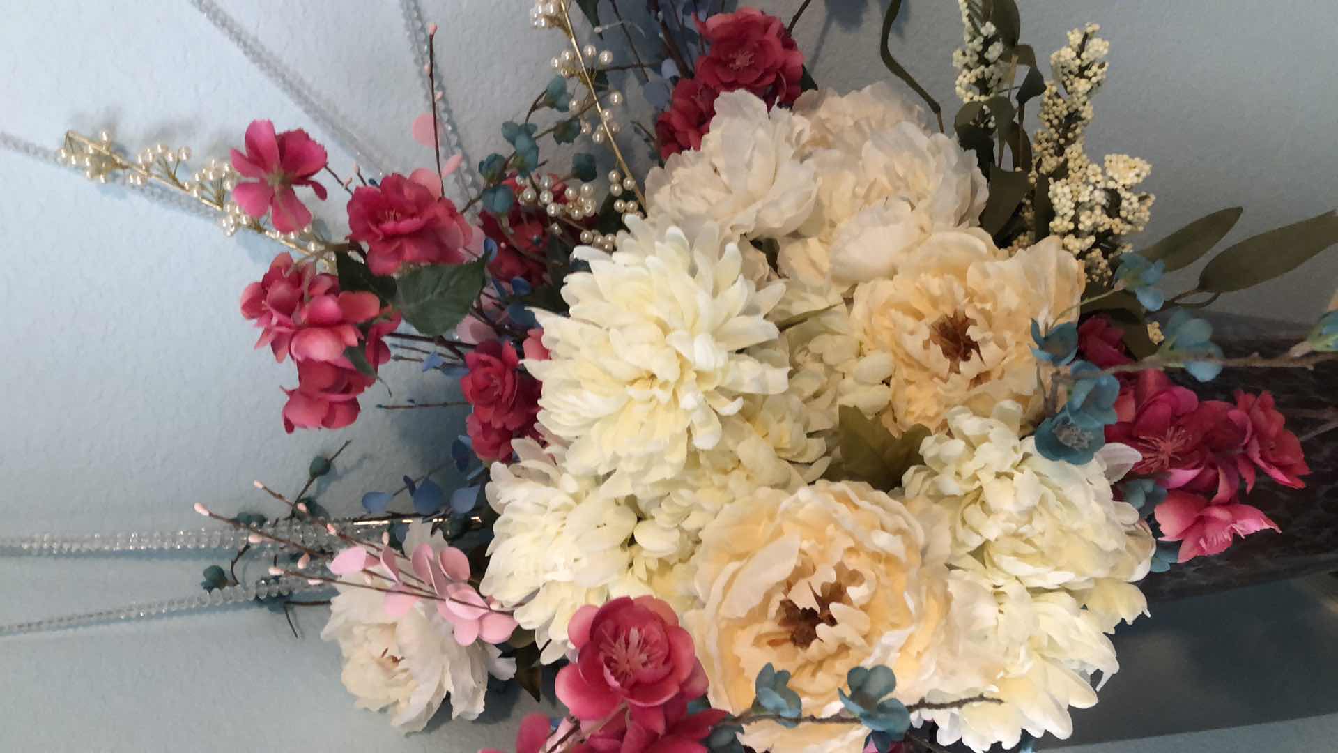 Photo 1 of FLORAL ARRANGEMENT IN GLASS VASE H 60”