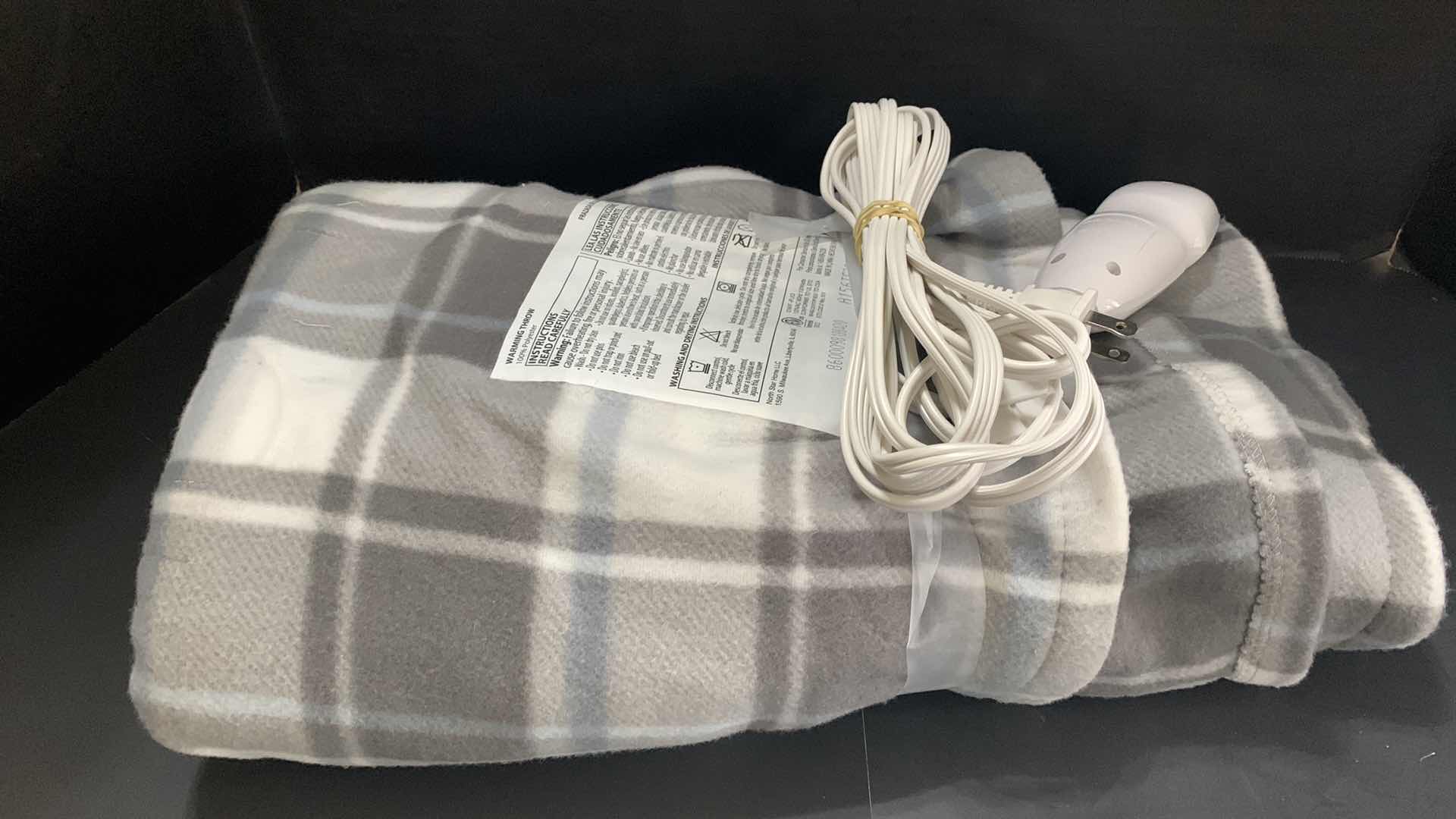 Photo 1 of ELECTRIC BLANKET AND 2 BLUE ACCENT PILLOWS