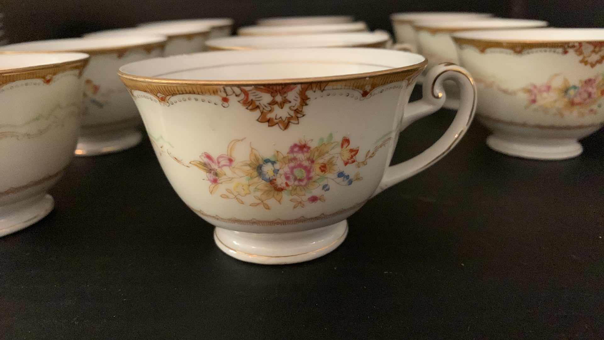 Photo 1 of SAMPY HAND PAINTED DAPHNE TEA CUPS (11), SAUCERS (12), SUGAR CADDY AND CREAMER