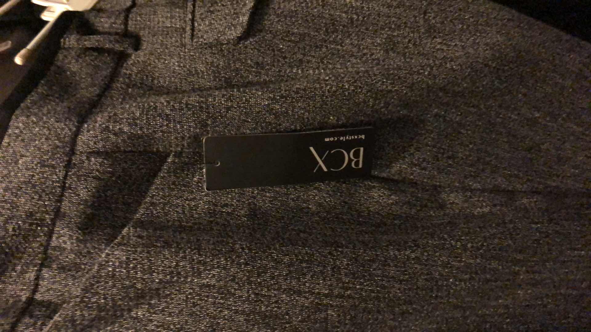 Photo 1 of WOMENS SKIRTS, PANTS AND TOPS SIZE L-XL