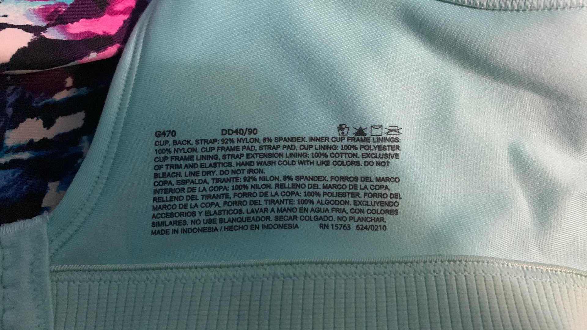 Photo 1 of WOMENS WORKOUT CLOTHES AND 2 SWIMSUITS