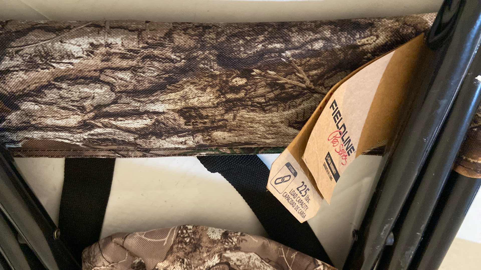 Photo 1 of A FIELDLINE CAMPING COT AND AN ERGONOMIC CHAIR