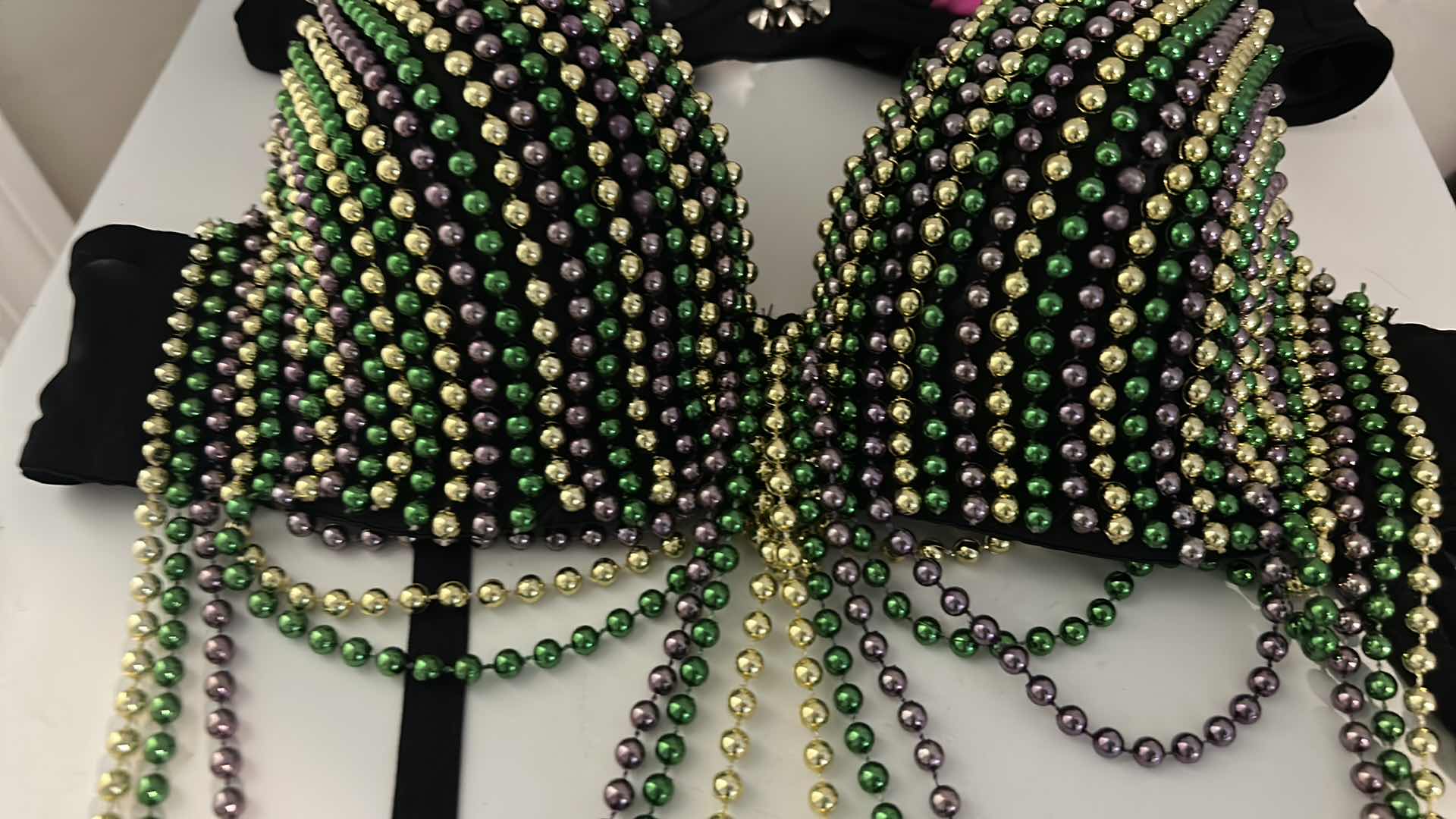 Photo 1 of WOMENS BEADED BRAS 1 SMALL, 1 MED BOTH HAVE STRAPS