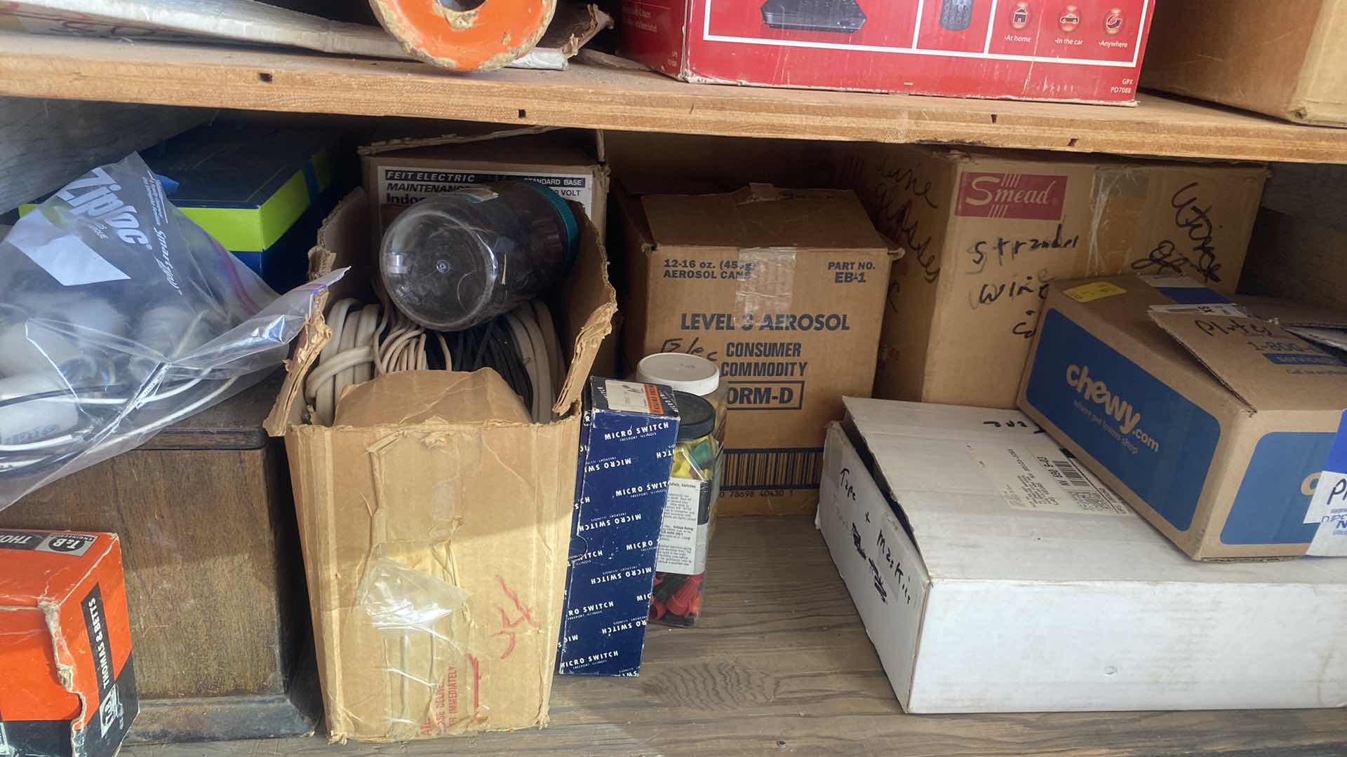 Photo 1 of CABINET ON WHEELS WITH CONTENTS OF GARAGE CABINET - PAINT TARPS CAULK AND MORE