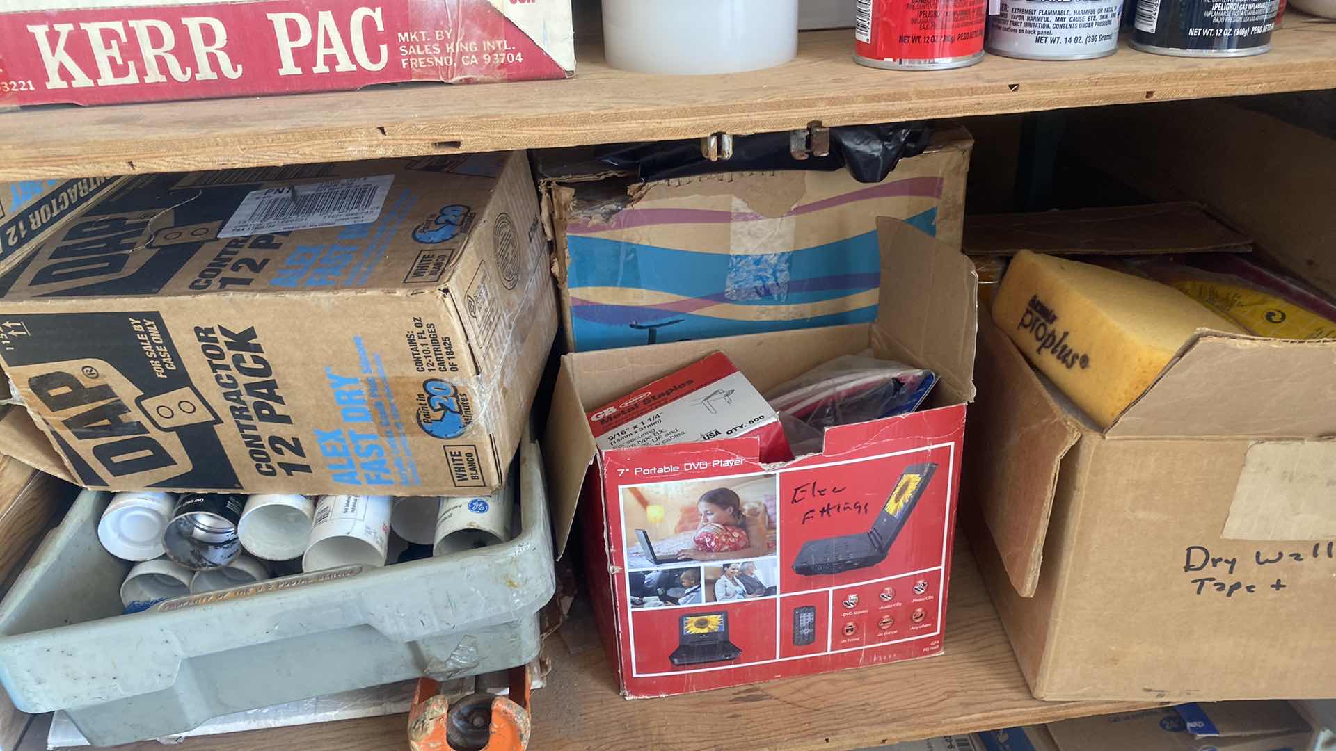 Photo 1 of CABINET ON WHEELS WITH CONTENTS OF GARAGE CABINET - PAINT TARPS CAULK AND MORE