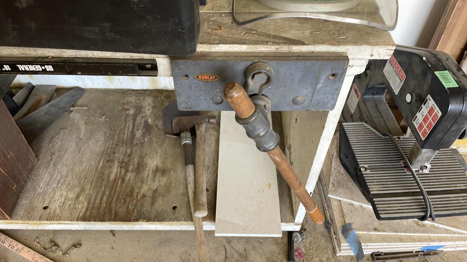 Photo 1 of BENCH WITH VICE TOP CONTENTS AND SAWS NOT INCLUDED 48x 28x 33