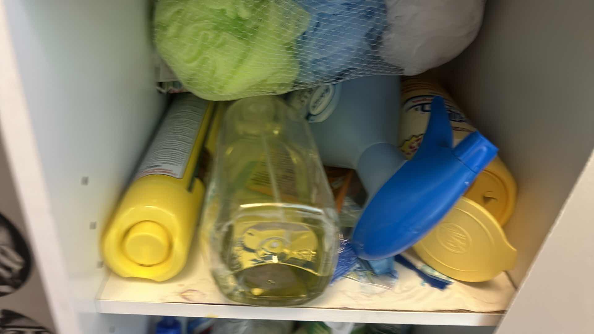 Photo 1 of CONTENTS OF CABINET- CLEANING SUPPLIES