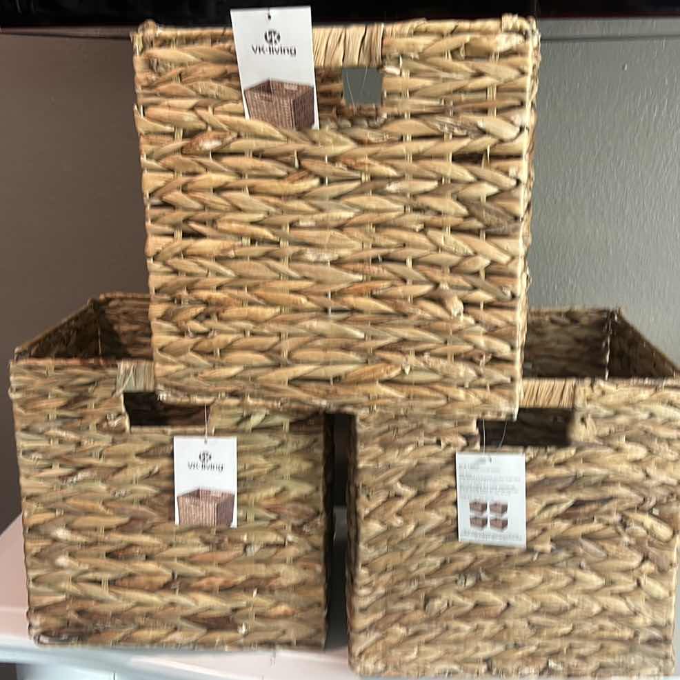 Photo 1 of FOUR WOVEN WICKER STORAGE BASKETS, THREE OF WHICH ARE COLLAPSIBLE.