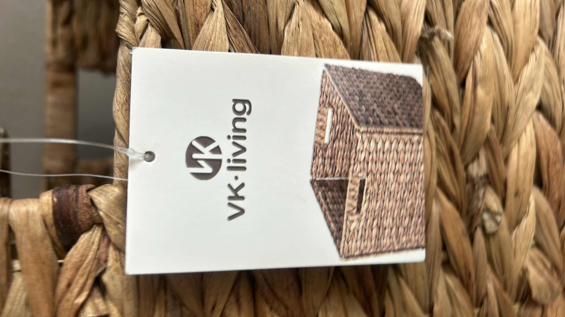 Photo 1 of FOUR WOVEN WICKER STORAGE BASKETS, THREE OF WHICH ARE COLLAPSIBLE.