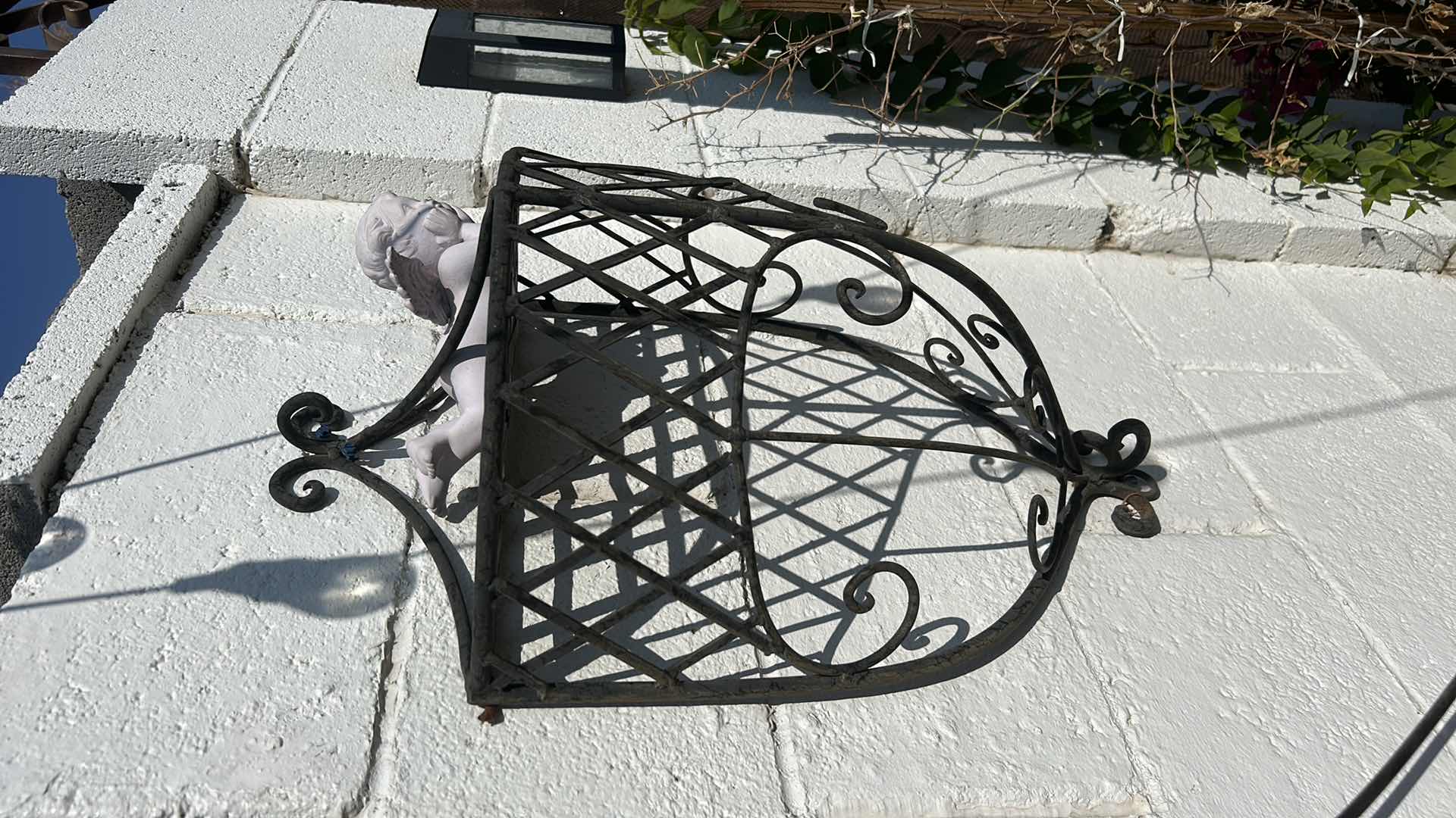 Photo 1 of OUTDOOR DECOR, BLACK METAL, SCULPTURE, H2’ AND CERAMIC ANGEL.