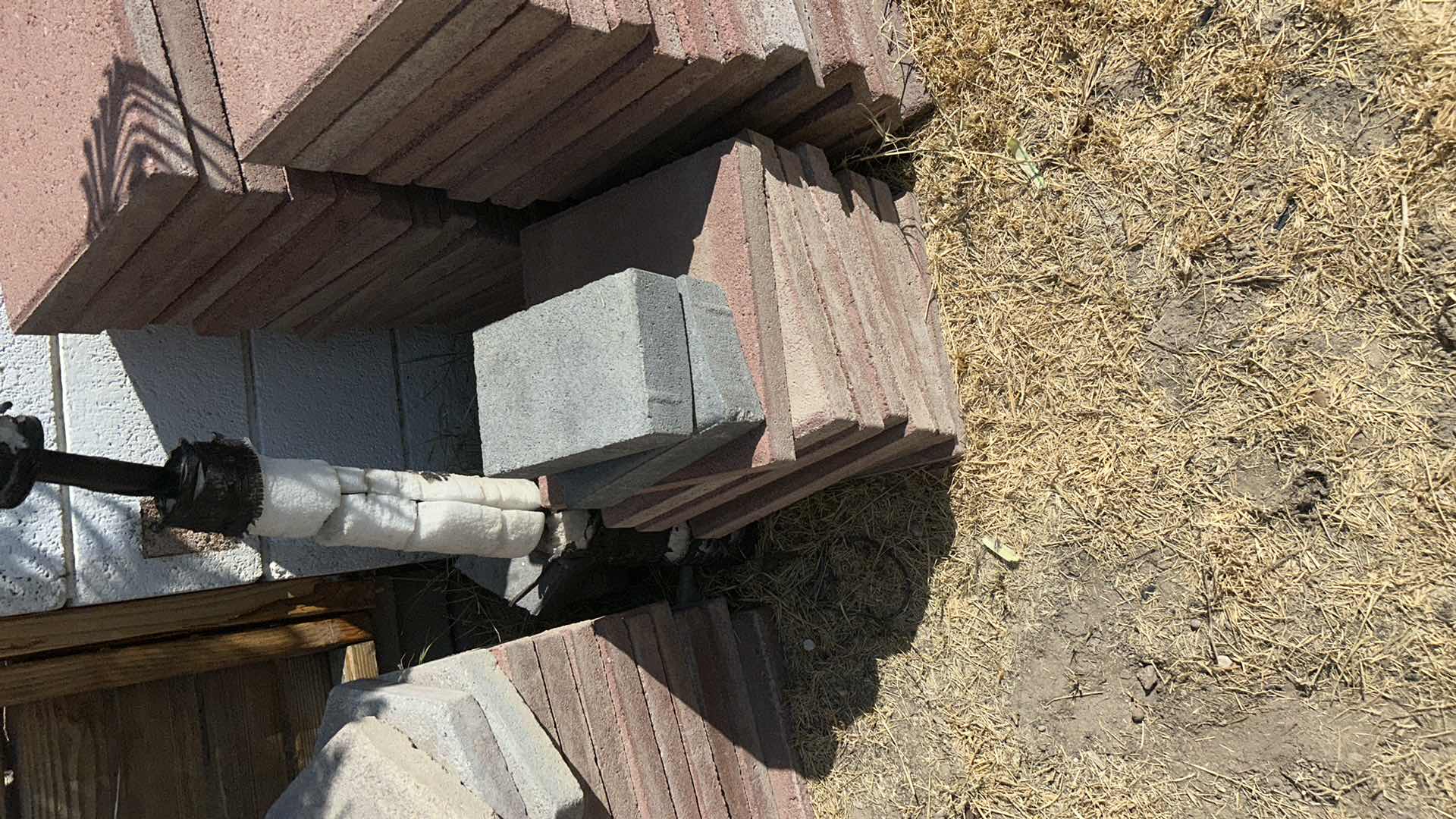 Photo 1 of BUILDING MATERIALS (PALMTREE NOT INCLUDED) RED TILES 12” x 12”