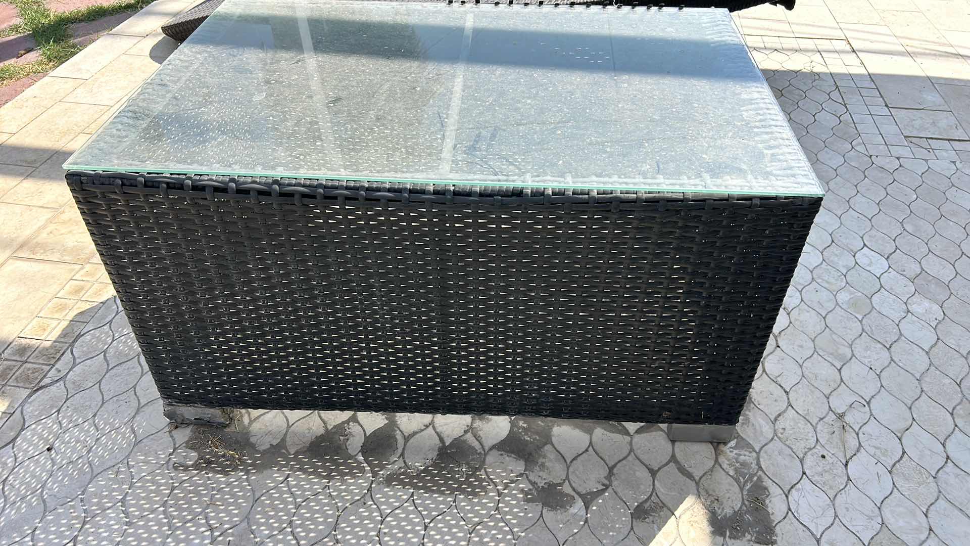 Photo 1 of OUTDOOR FURNITURE FAUX RATTAN COFFEE TABLE WITH GLASS TOP 34" X 22 1?4" X 18 1?4".