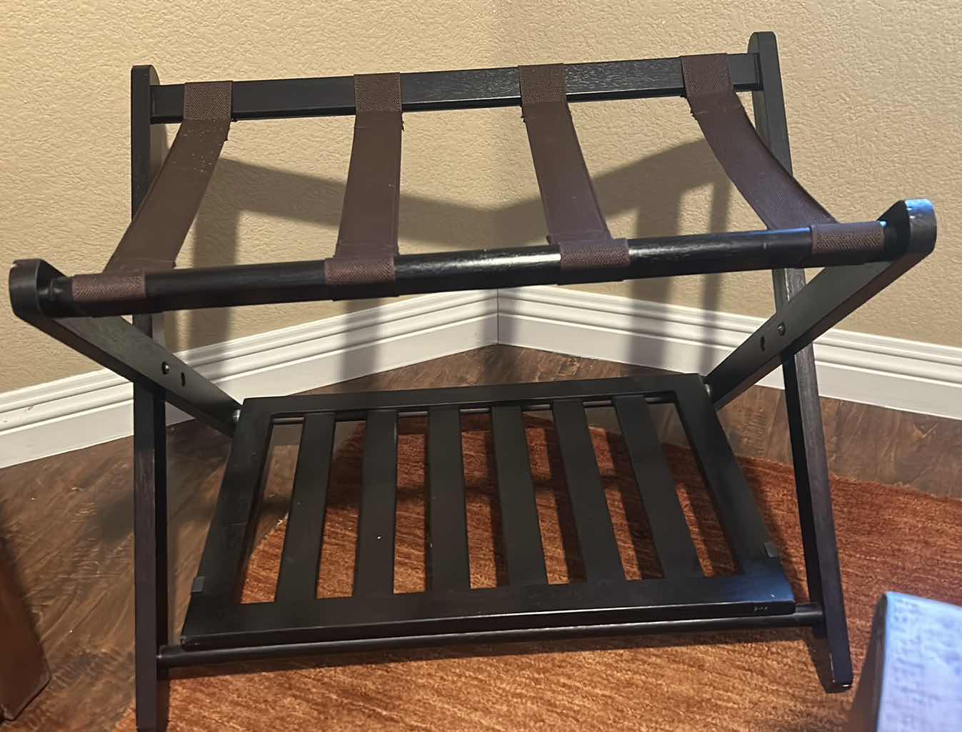 Photo 1 of DARK WOOD COLLAPSIBLE LUGGAGE HOLDER.