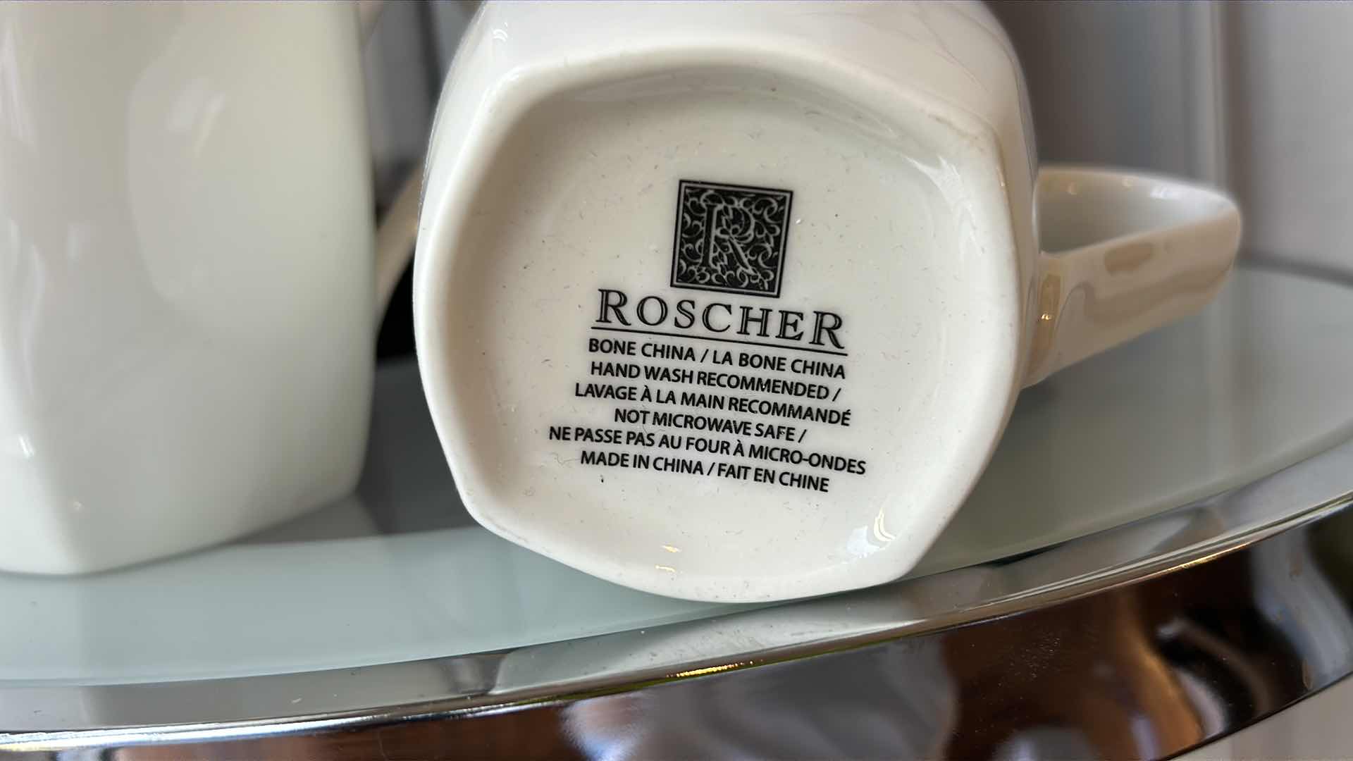 Photo 1 of COFFEE STATION - VERISMO COFFEE MAKER . WELCOME SIGN. TWO BONECHINA COFFEE MUGS BY ROCHERE & ANTHEM COUNTRY CLUB BOTTLED WATER.