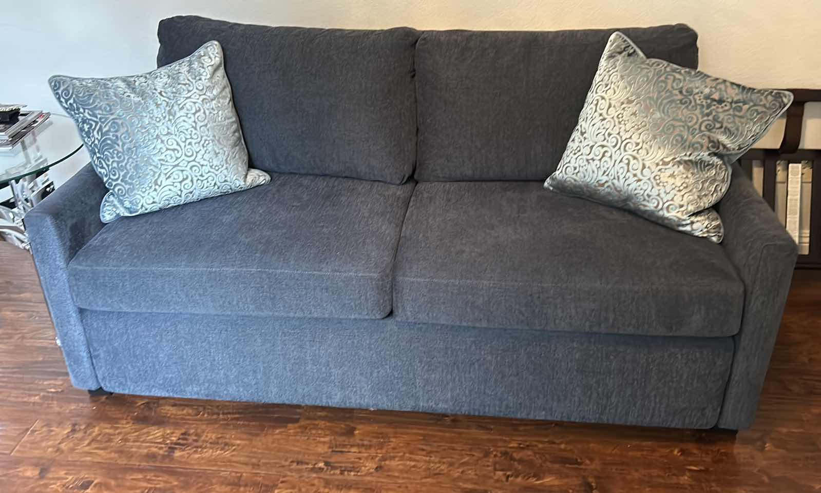Photo 1 of BLUE EVERYDAY SLEEPER SOFA BED WITH BLUE DENIM-LIKE COLORED FABRIC AND TWO PILLOWS. COUCH MEASURES 65"X 38" X H 34"".