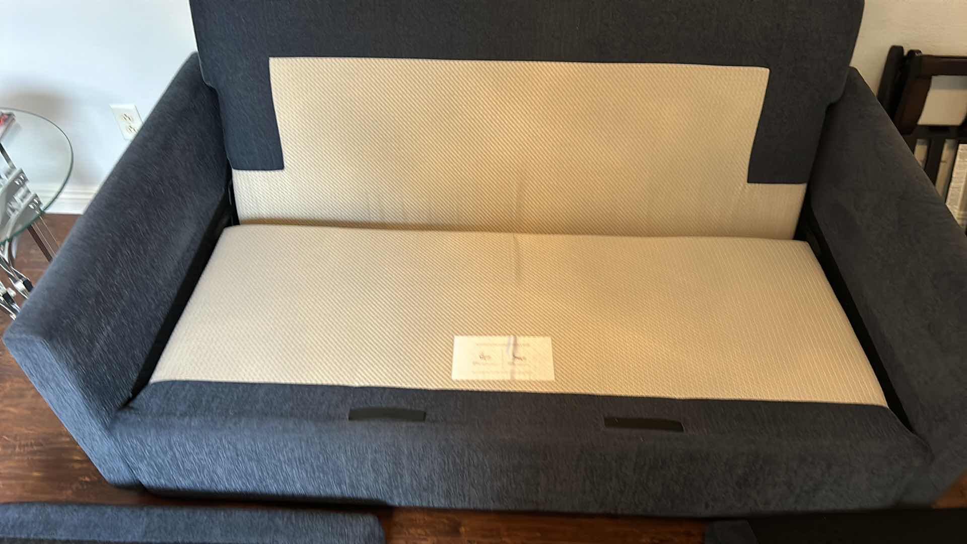 Photo 1 of BLUE EVERYDAY SLEEPER SOFA BED WITH BLUE DENIM-LIKE COLORED FABRIC AND TWO PILLOWS. COUCH MEASURES 65"X 38" X H 34"".