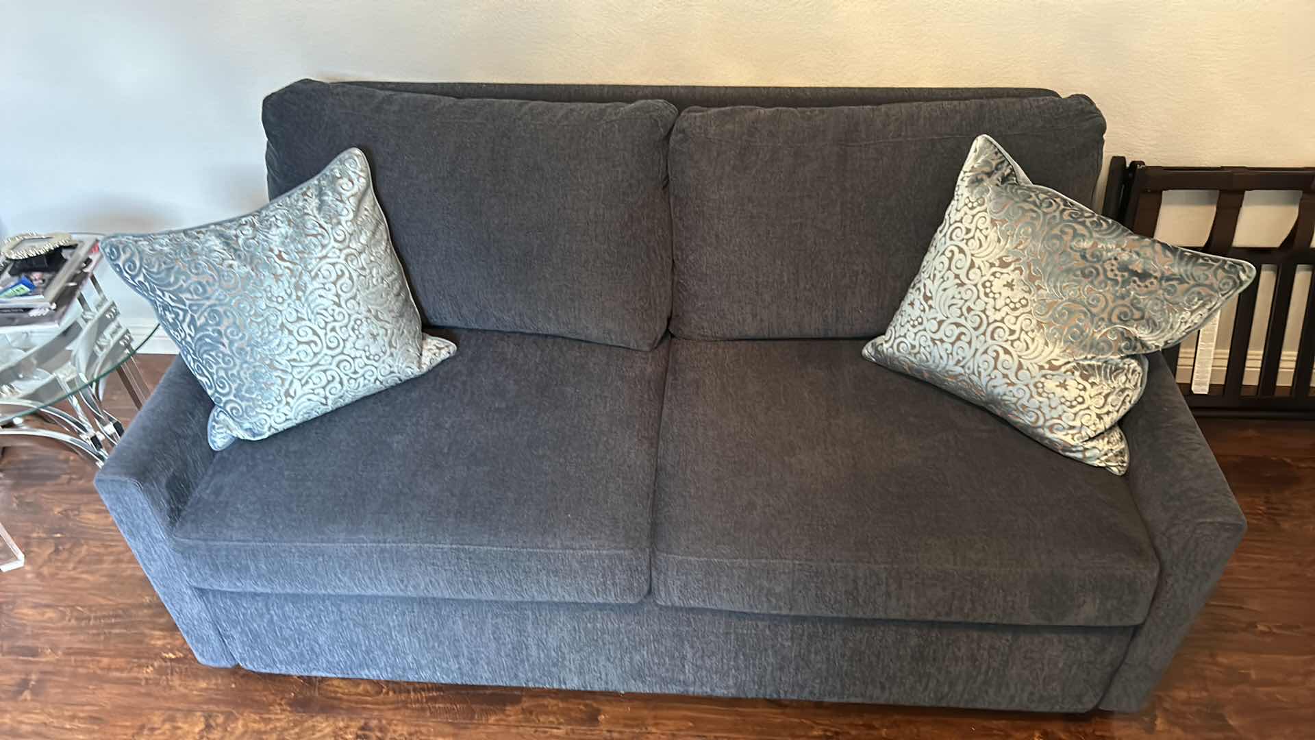 Photo 1 of BLUE EVERYDAY SLEEPER SOFA BED WITH BLUE DENIM-LIKE COLORED FABRIC AND TWO PILLOWS. COUCH MEASURES 65"X 38" X H 34"".