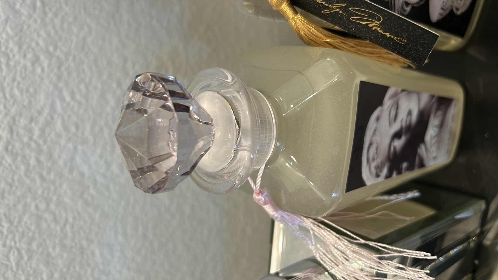 Photo 1 of MARILYN MONROE BATHROOM ACCESSORIES. CHAMPAGNE-SCENTED HAND SOAP. FAME IS LIKE CAVIAR-SCENTED BUBBLE BATH.