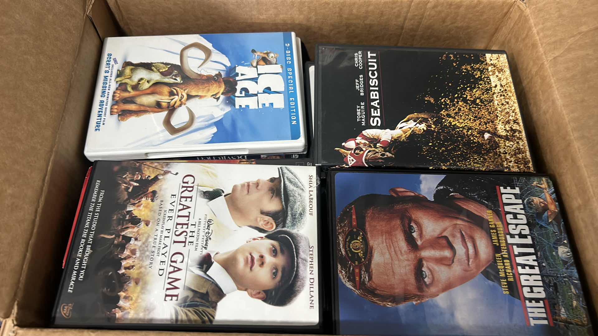 Photo 1 of BOX FULL OF DVDS, MANY MORE THAN PHOTOGRAPHED.