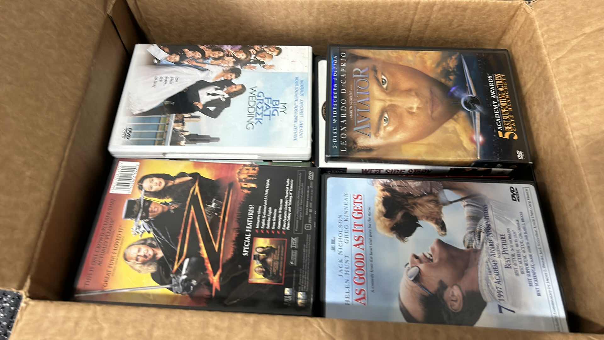 Photo 1 of BOX FULL OF DVDS, MANY MORE THAN PHOTOGRAPHED.