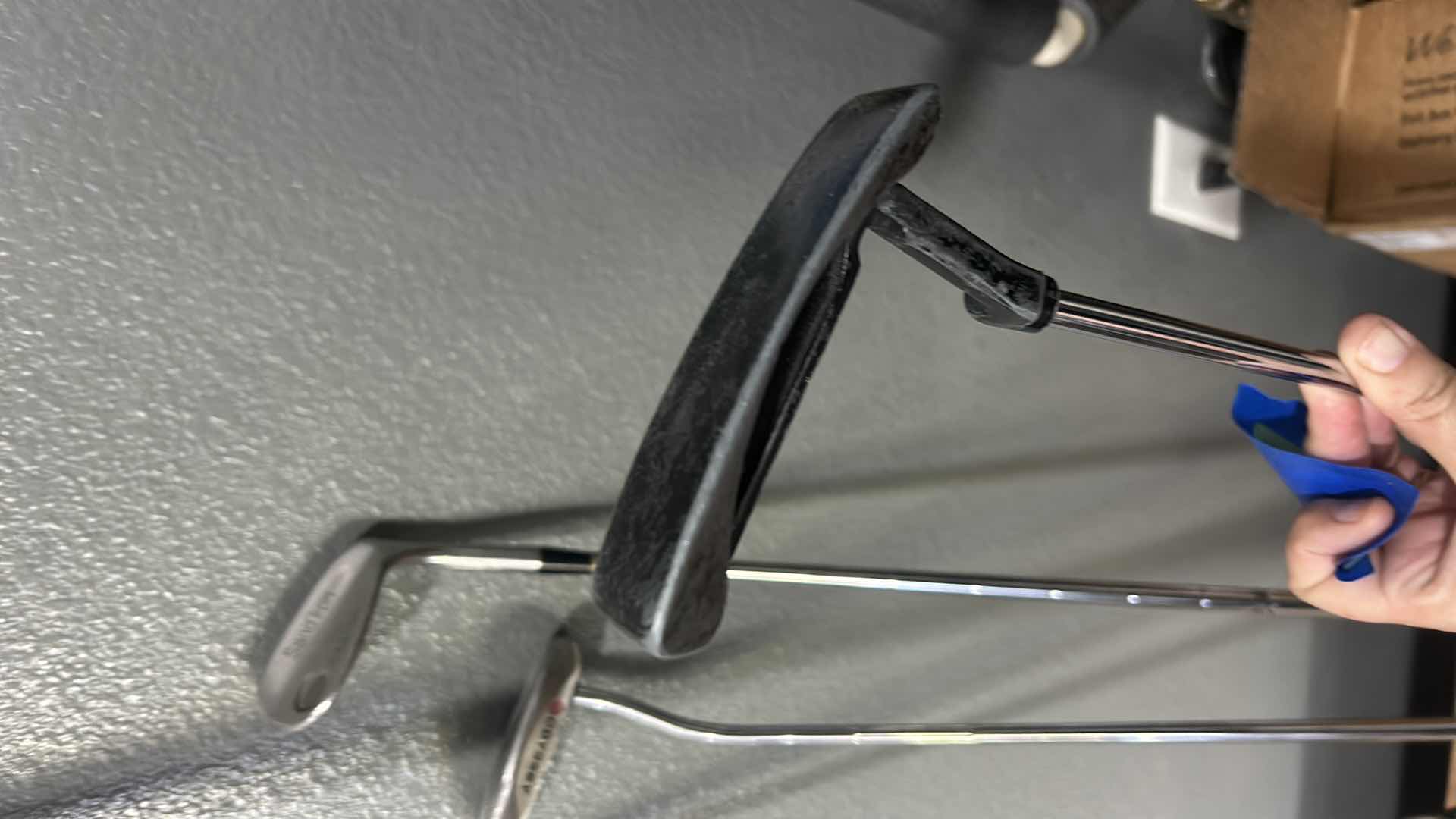 Photo 7 of FOUR GOLF CLUBS AND ONE ALIGNMENT POLE GOLF ACCESSORY.