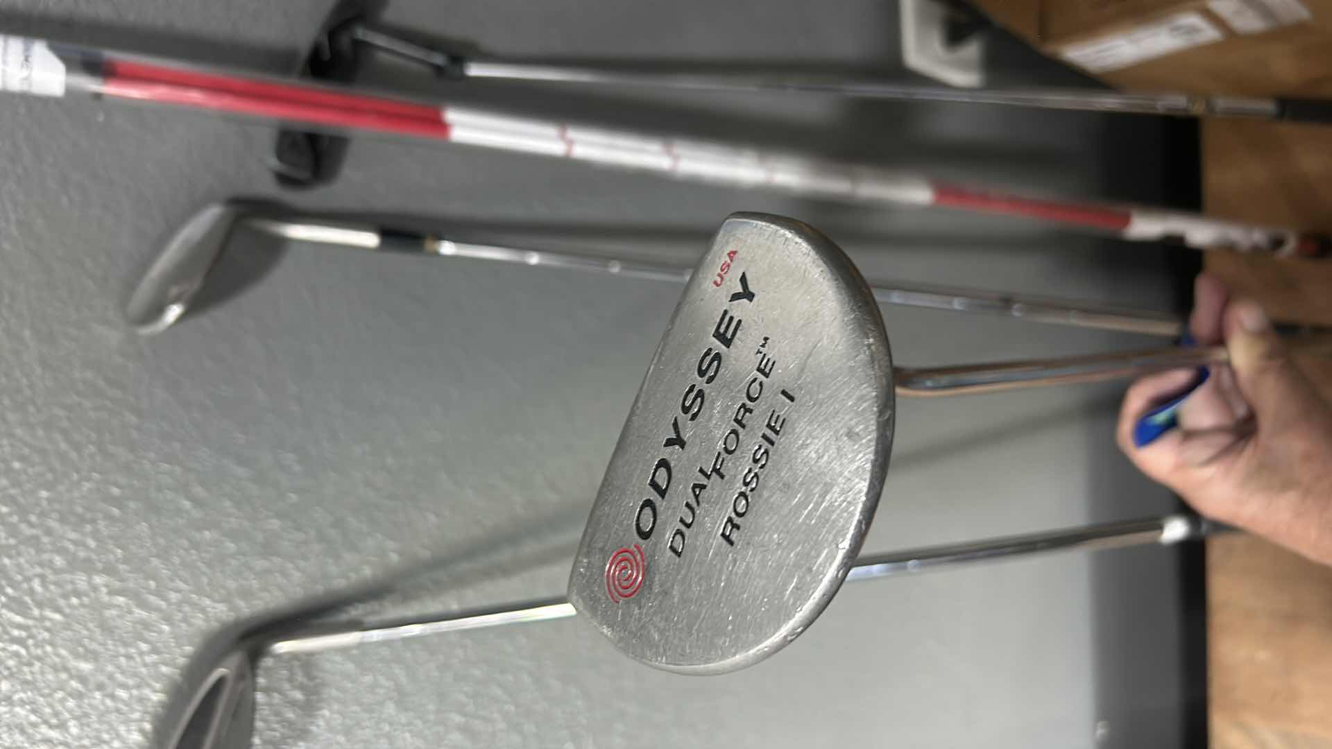 Photo 3 of FOUR GOLF CLUBS AND ONE ALIGNMENT POLE GOLF ACCESSORY.