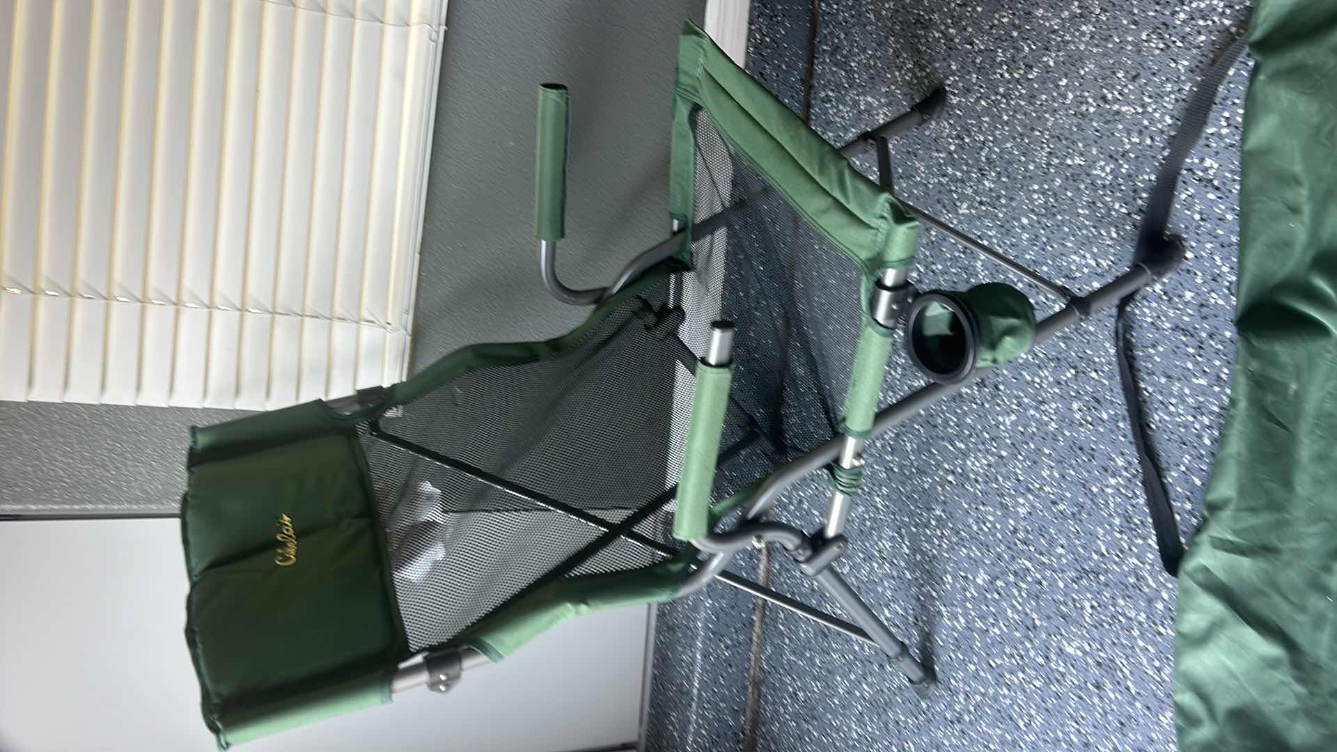 Photo 1 of CABELA'S OVERSIZED MESH FOLDING CHAIR.